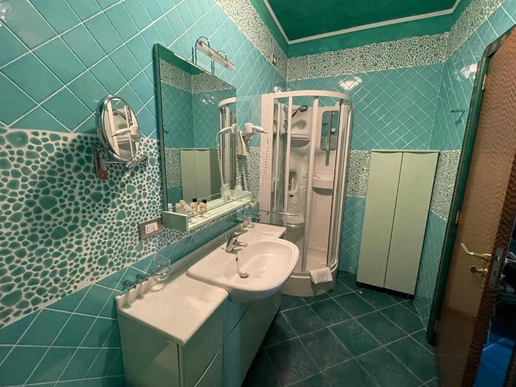 Bathroom in AH Premium Baia dei Faraglioni