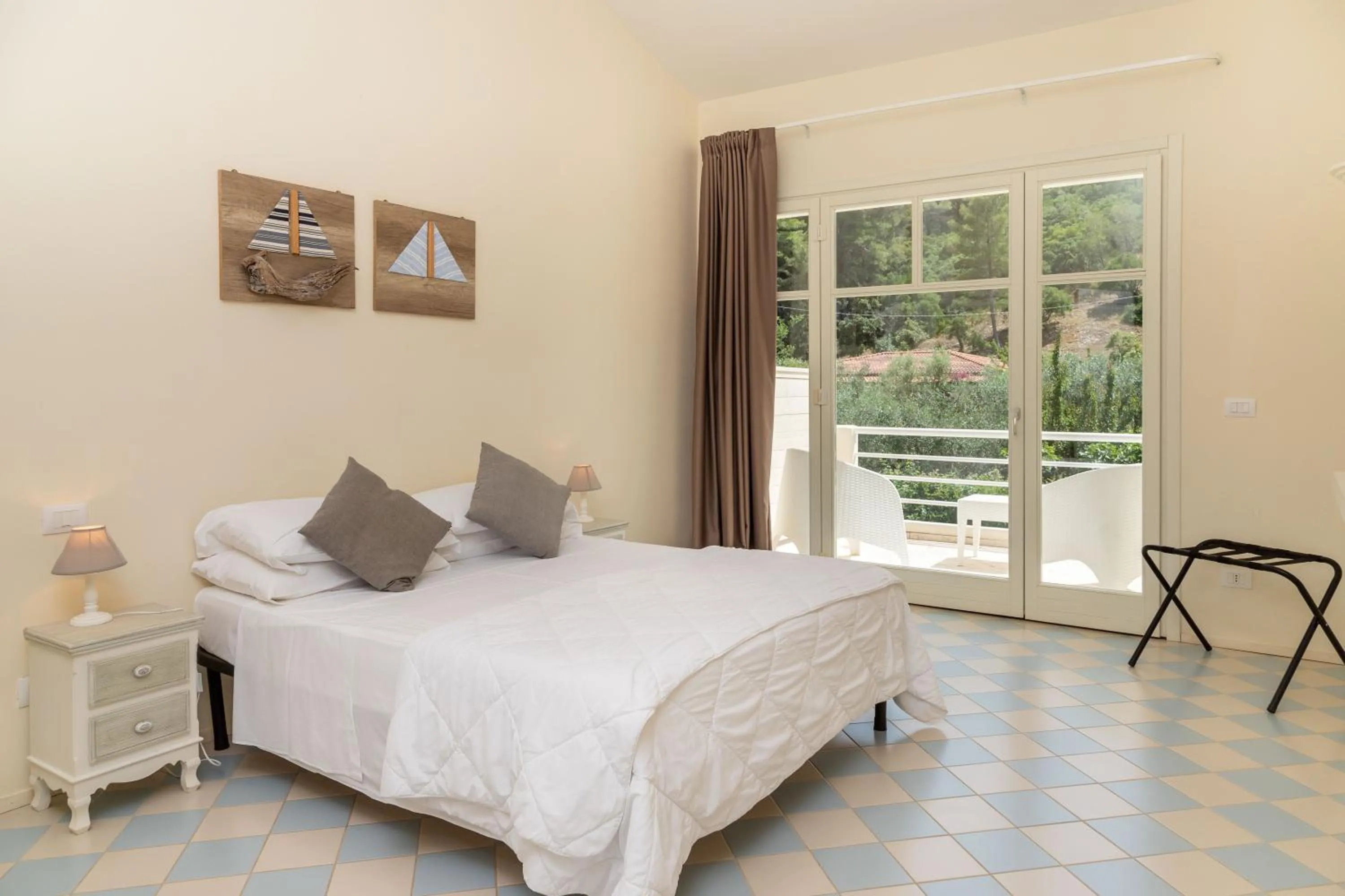 Bed in AH Premium Baia dei Faraglioni