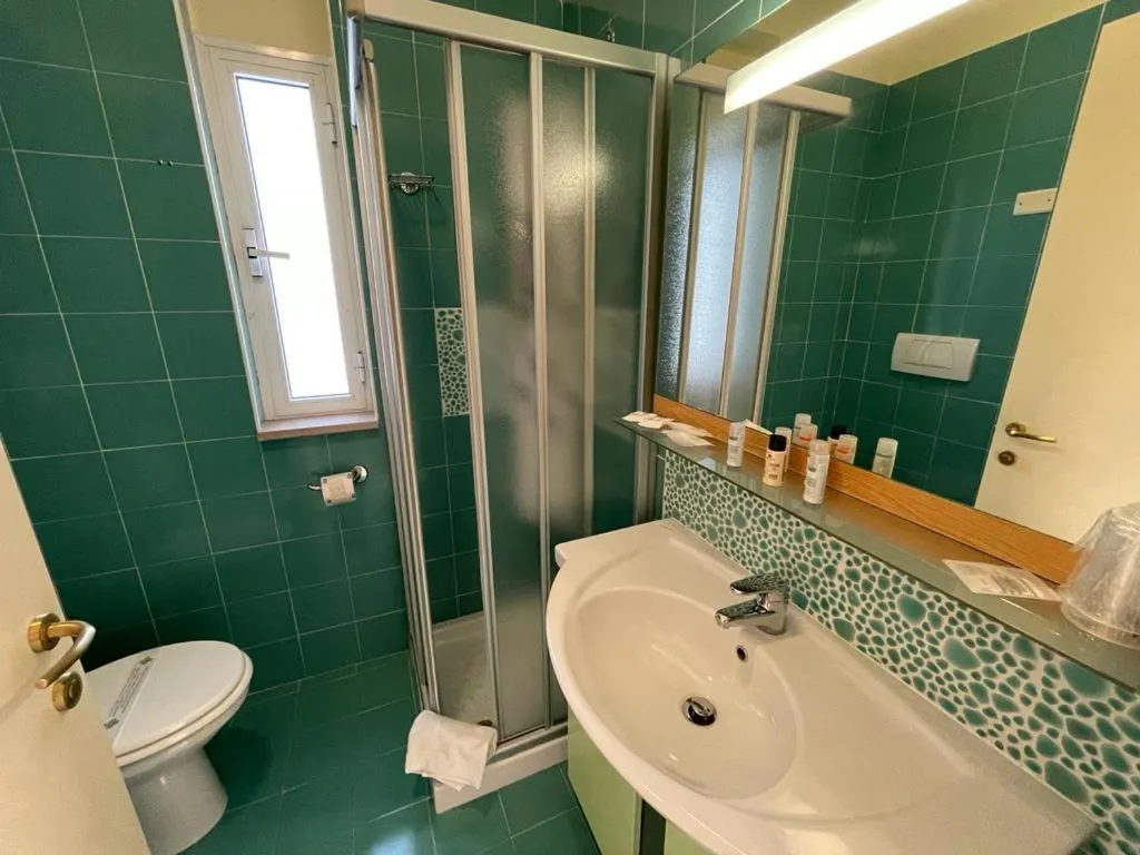 Bathroom in AH Premium Baia dei Faraglioni