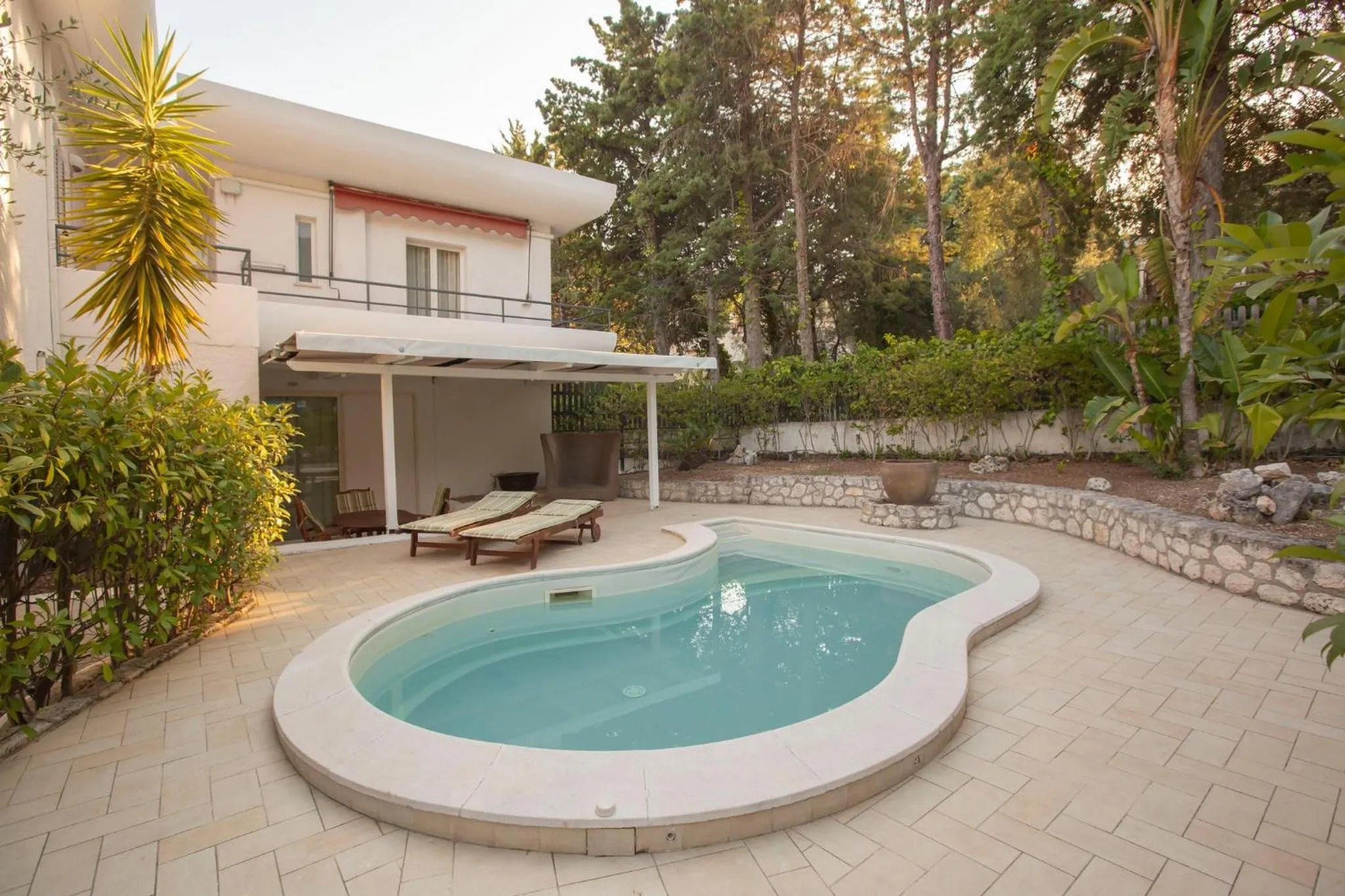 Swimming pool in AH Premium Baia dei Faraglioni