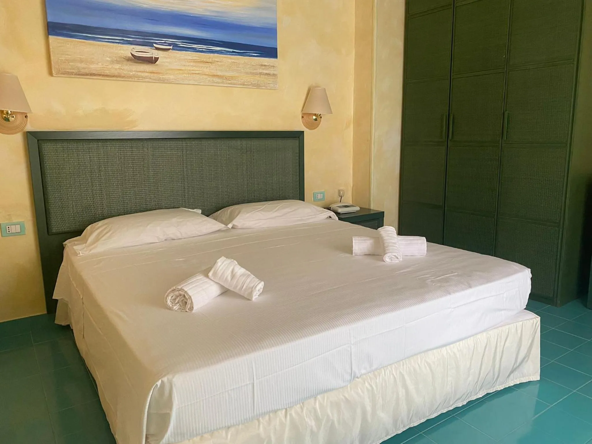 Bed in AH Premium Baia dei Faraglioni