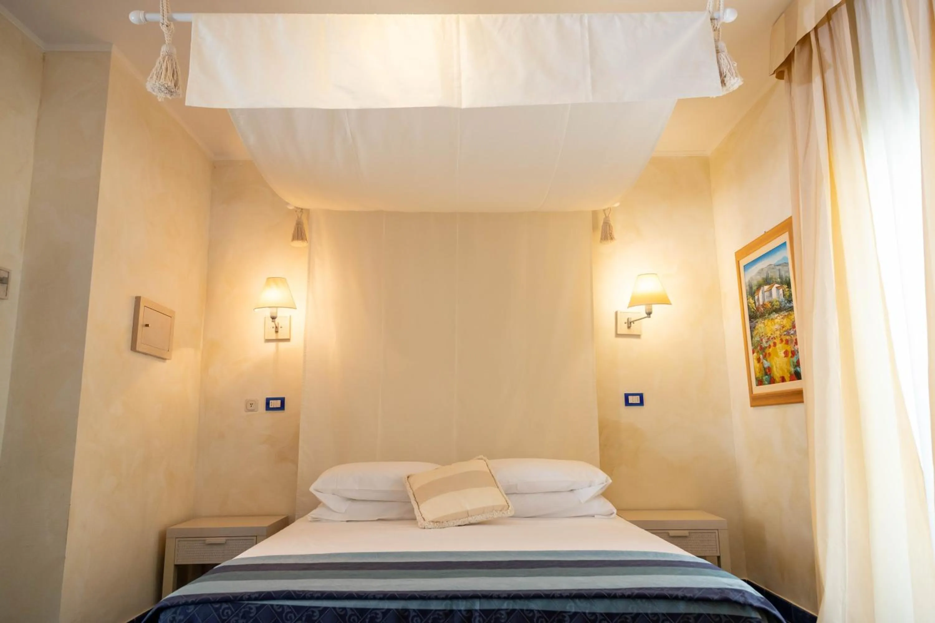 Bed in AH Premium Baia dei Faraglioni