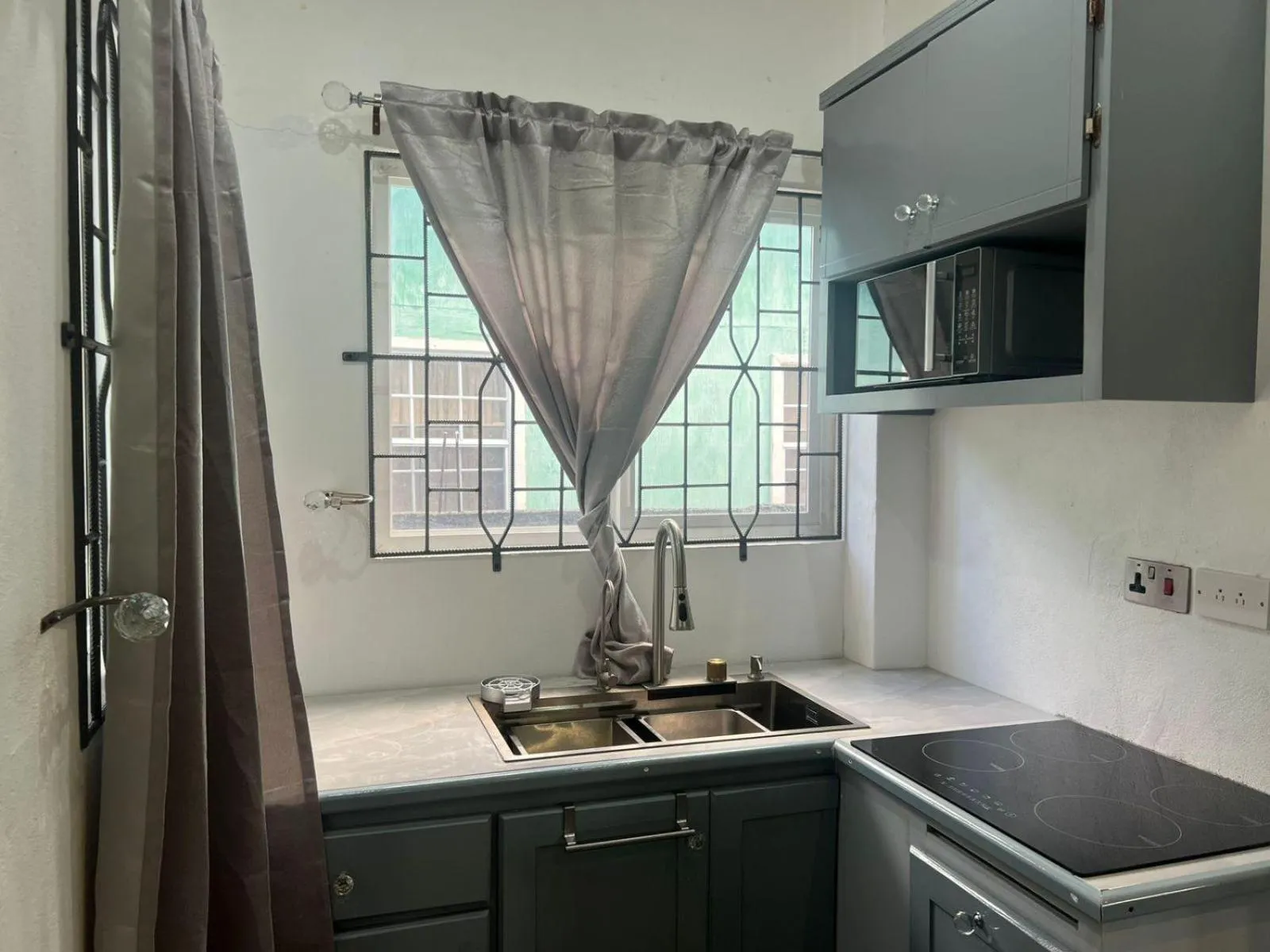 Kitchen or kitchenette in Clavier's- AirCon- Seaside- FamilyFriendly