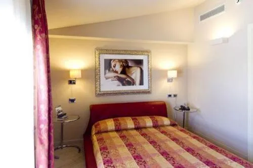 Bed in Hotel Touring