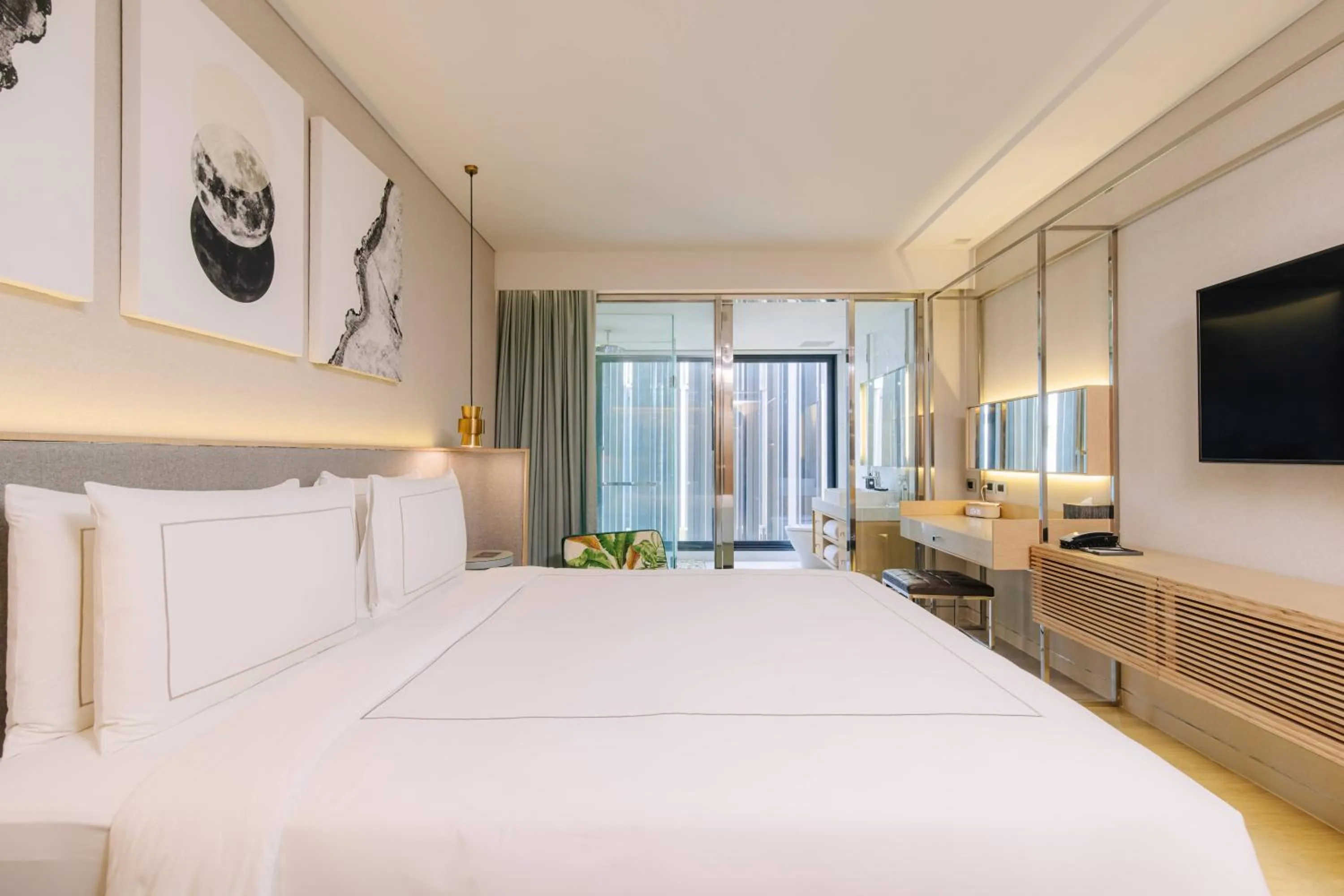 Bed in AMANOR Hotel Chiang Mai