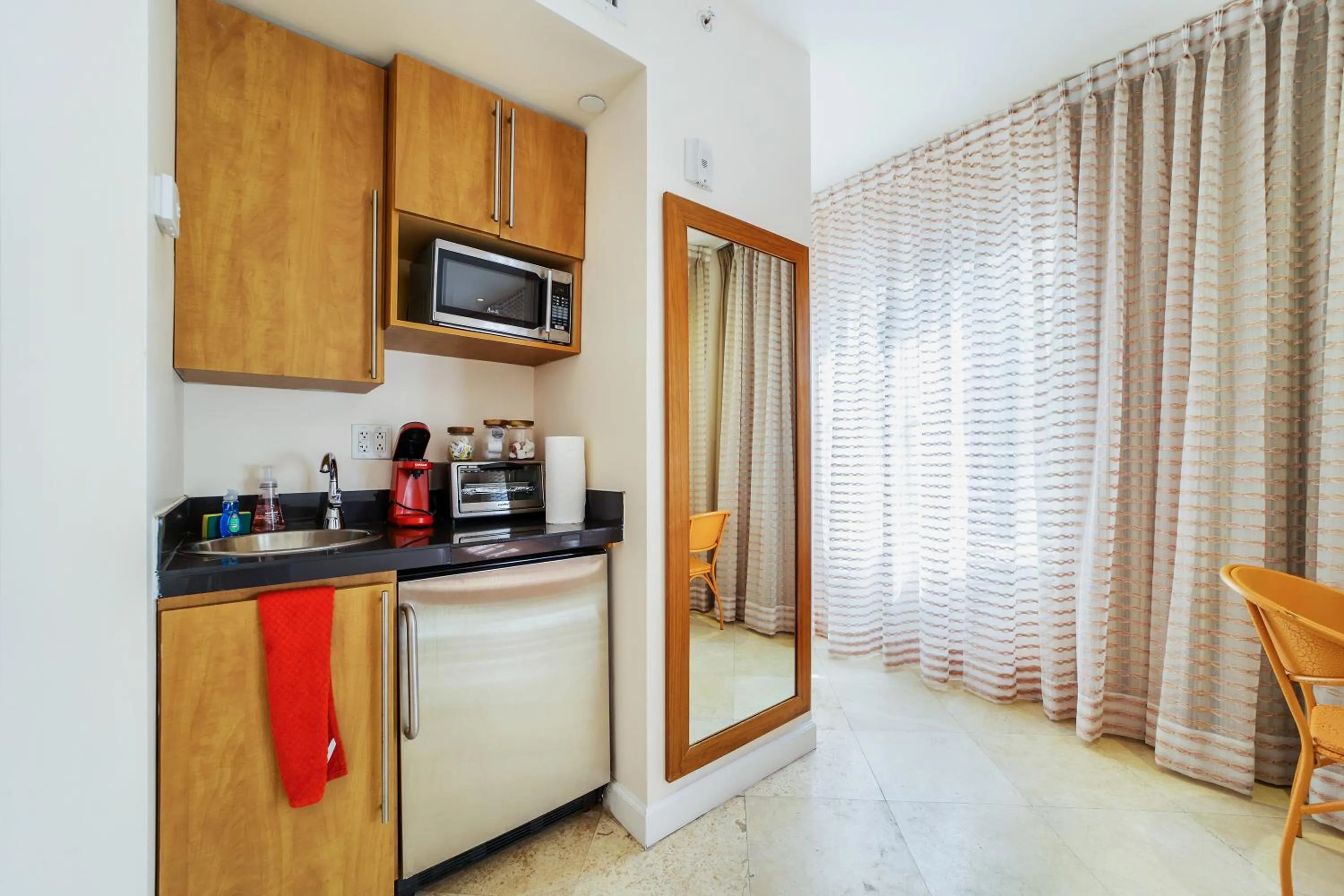 Kitchen or kitchenette in Casa Victoria Orchid Hotel