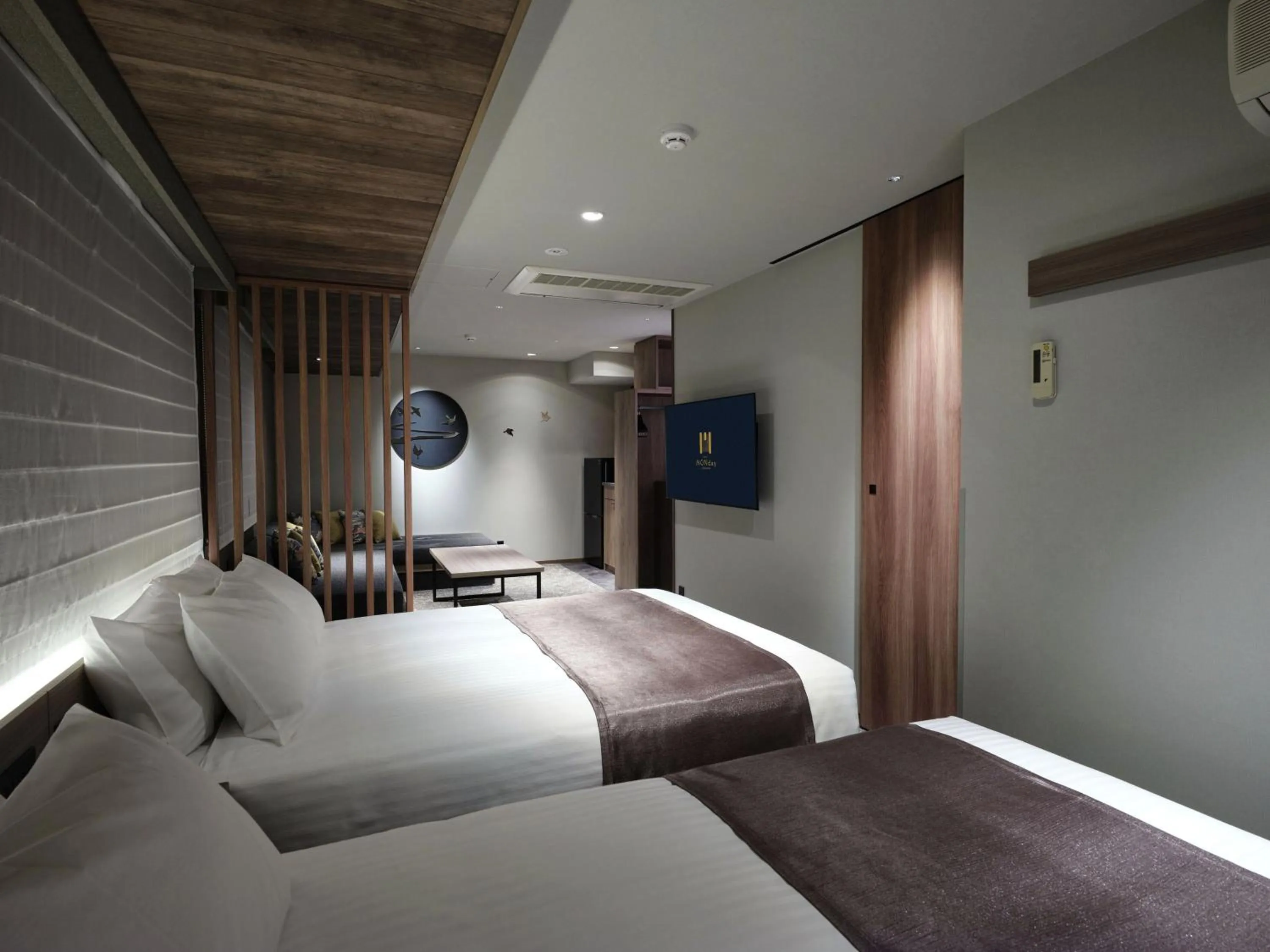 Bed in MONday Apart Premium Kyoto Sta Kamogawa