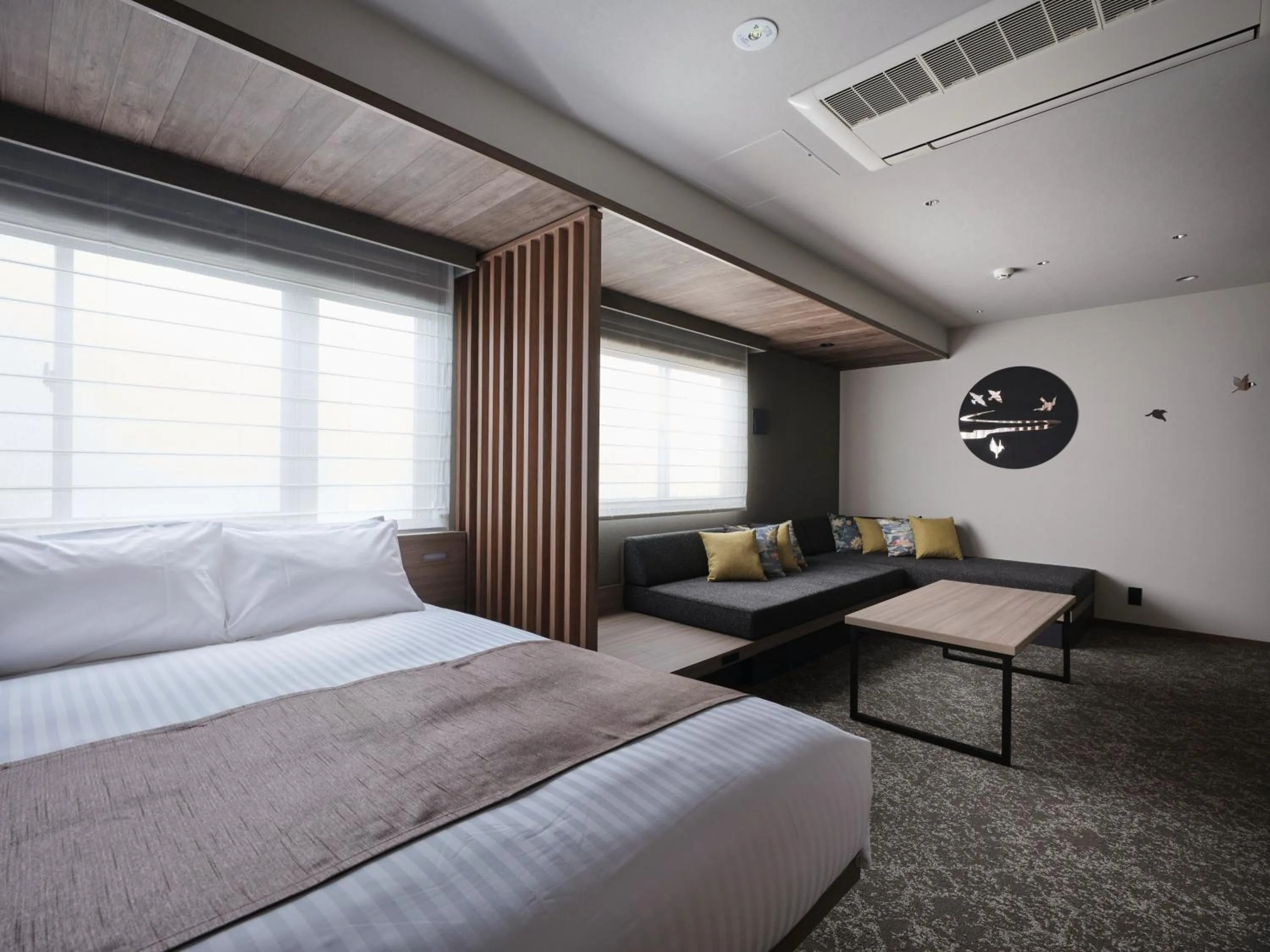 Bed in MONday Apart Premium Kyoto Sta Kamogawa