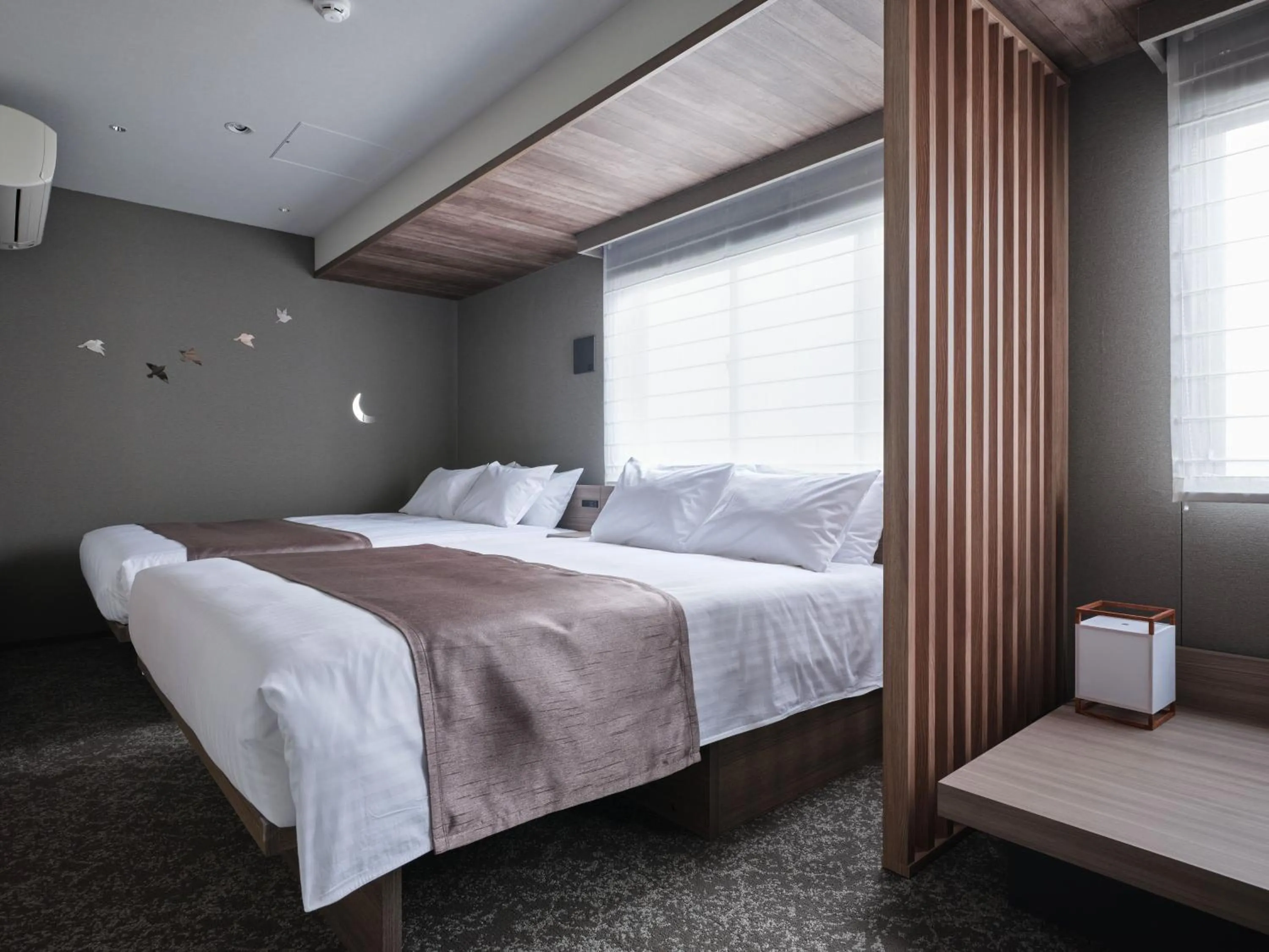 Bed in MONday Apart Premium Kyoto Sta Kamogawa