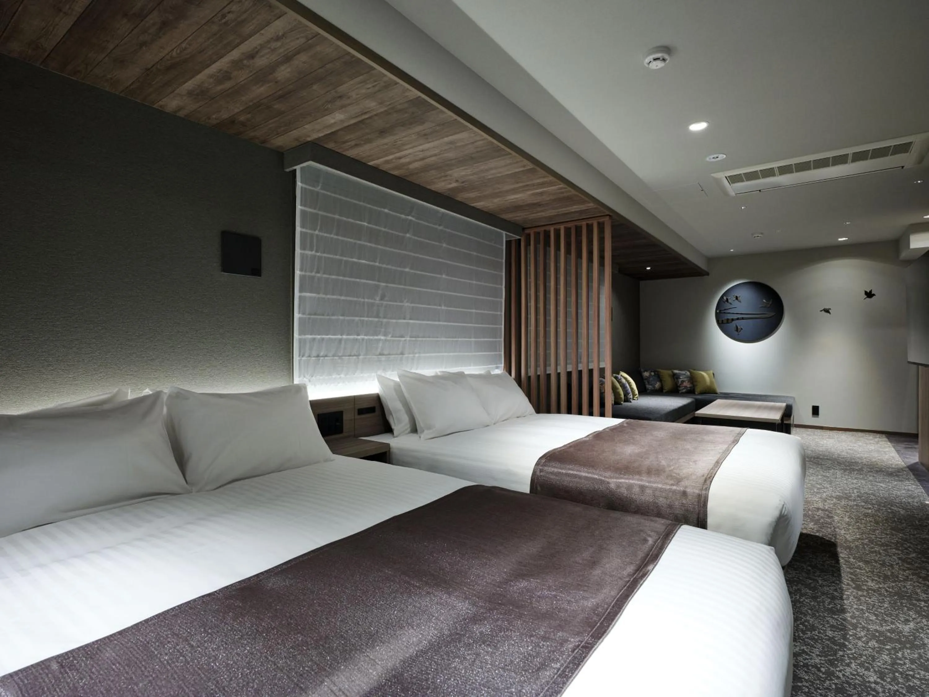 Bed in MONday Apart Premium Kyoto Sta Kamogawa