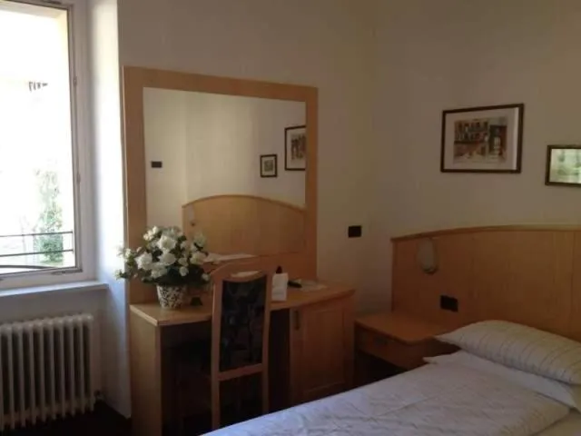 Bedroom, Bed in Albergo Mezzolago
