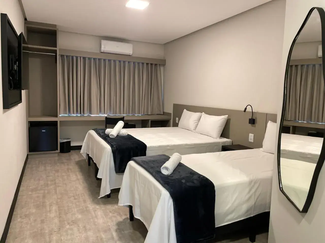 Triple Room in Escarpas Styles Hotel Triple Room in Escarpas Styles Hotel