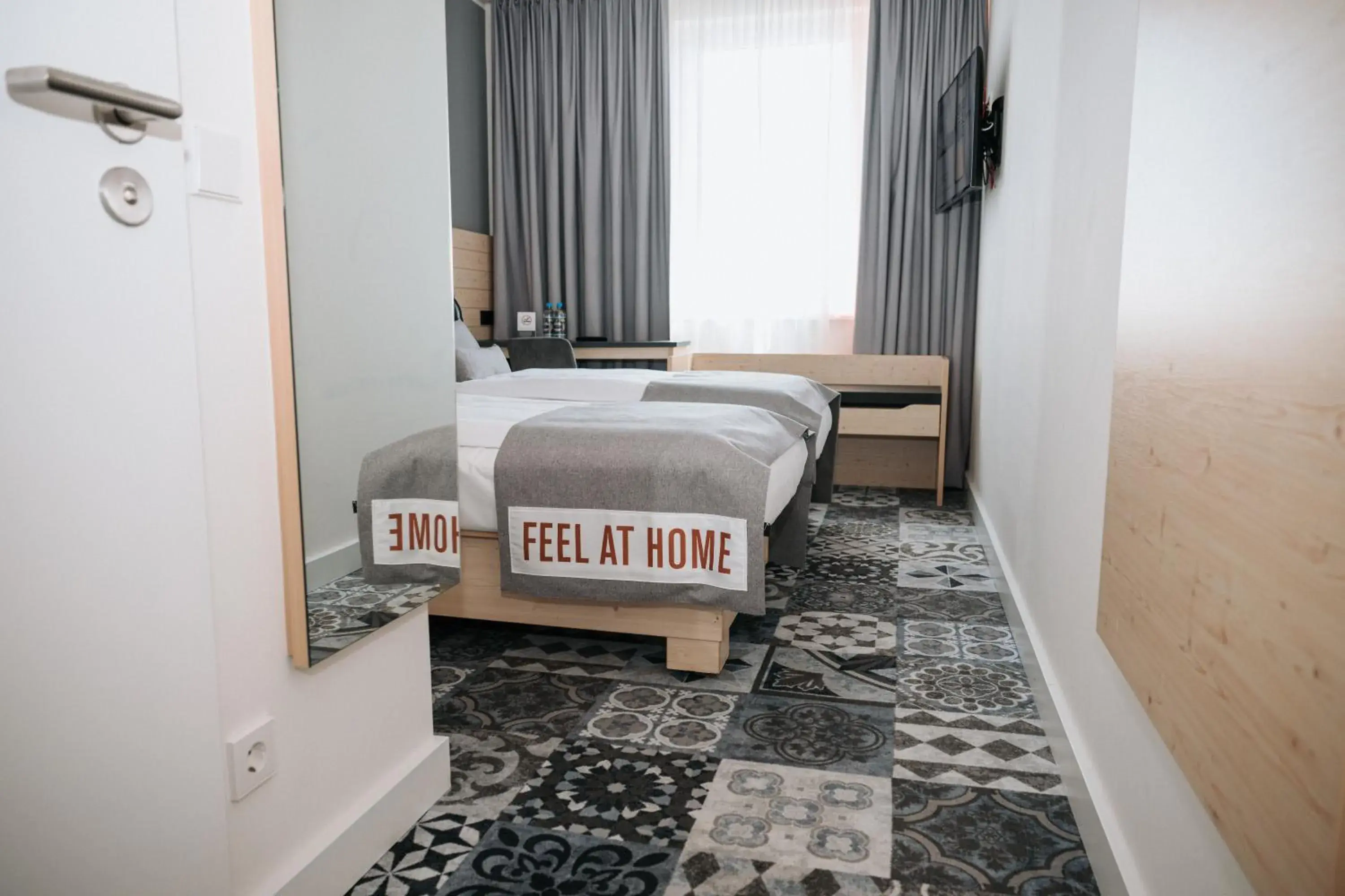 Photo of the whole room, Bed in Coffee Fellows Hotel München-Freiham Photo of the whole room, Bed in Coffee Fellows Hotel München-Freiham