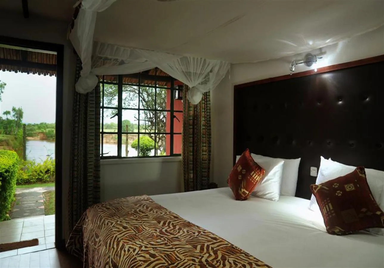 Photo of the whole room, Bed in Mara River Lodge