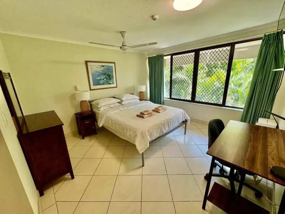 Bed in Downtown Delight 2BR Getaway with Pool