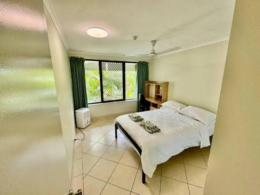 Bed in Downtown Delight 2BR Getaway with Pool