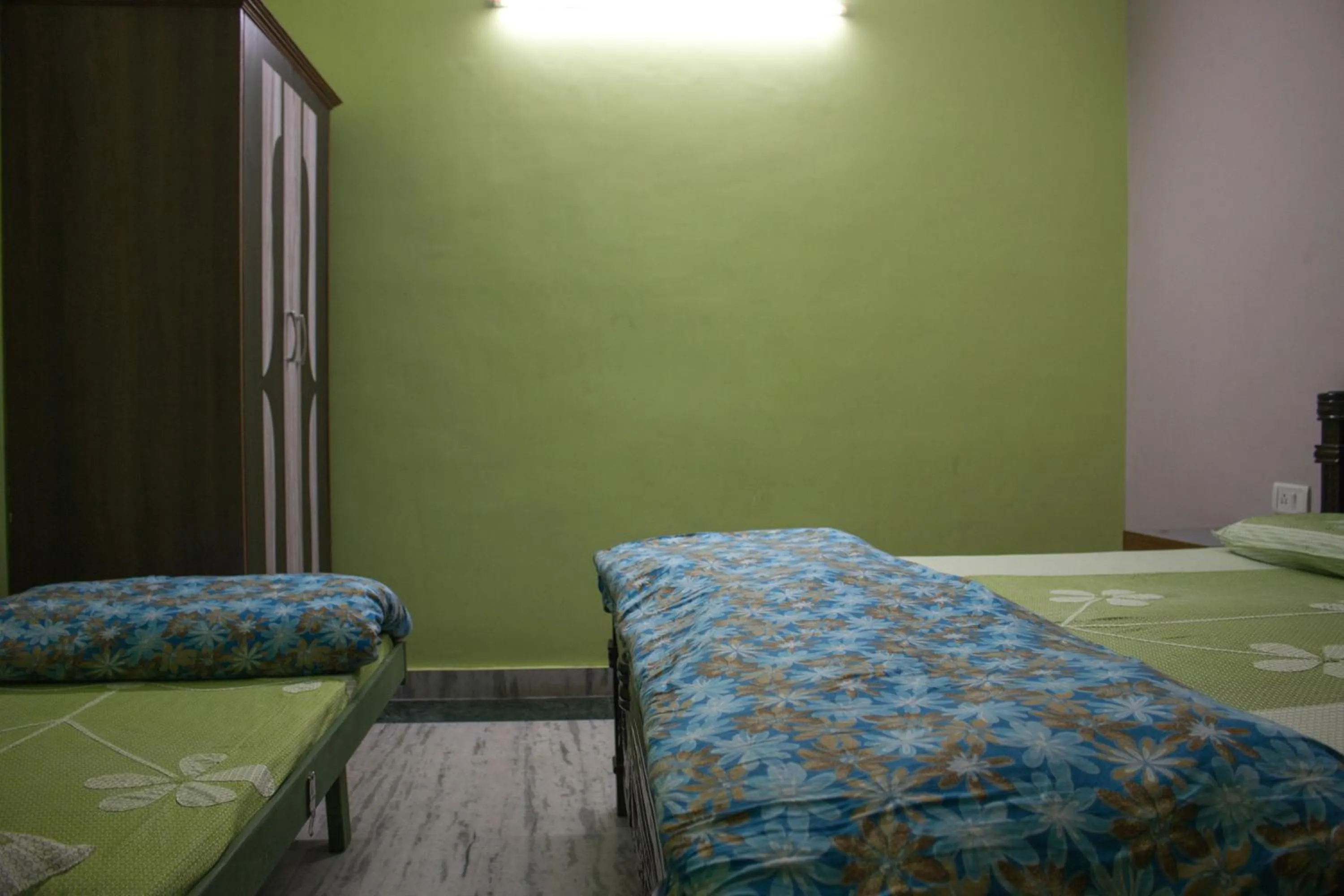 Bed in Hotel Golden Crown Laxman Jhula