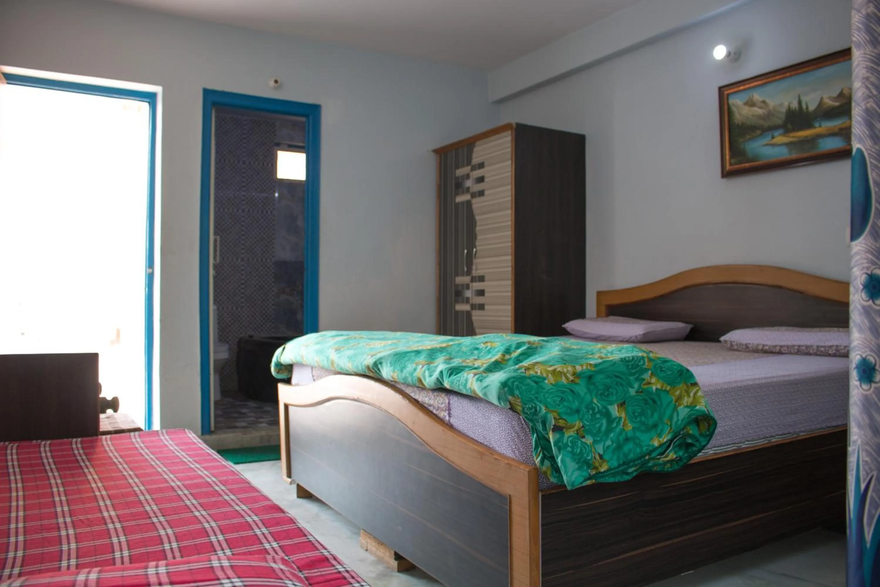 Bed in Hotel Golden Crown Laxman Jhula