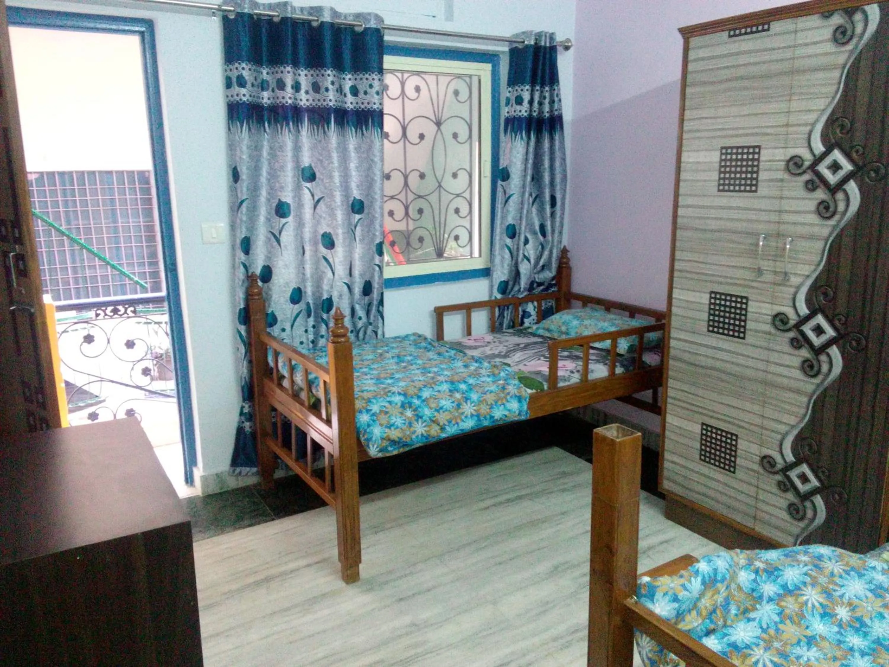 Photo of the whole room in Hotel Golden Crown Laxman Jhula