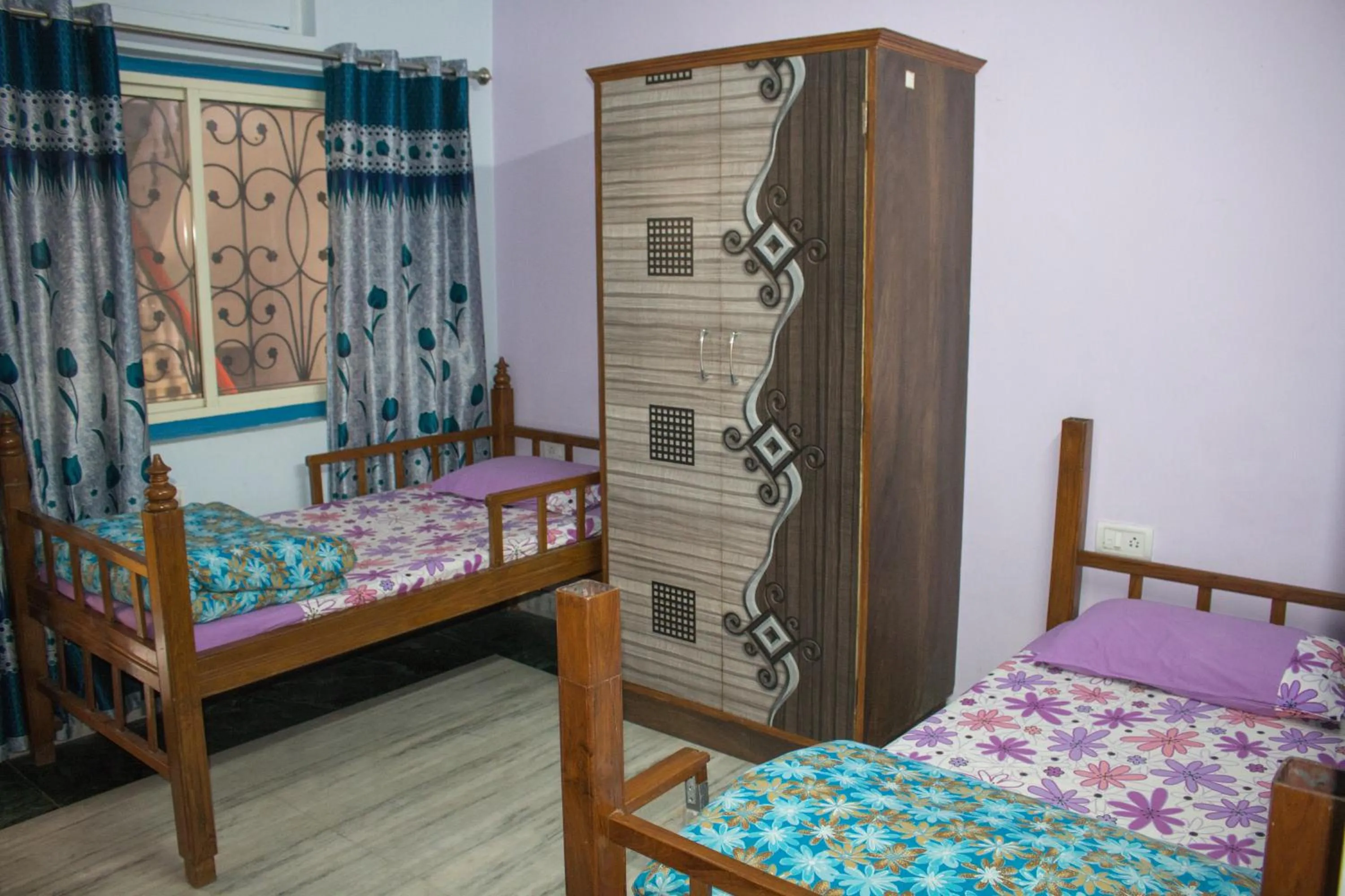 Photo of the whole room in Hotel Golden Crown Laxman Jhula