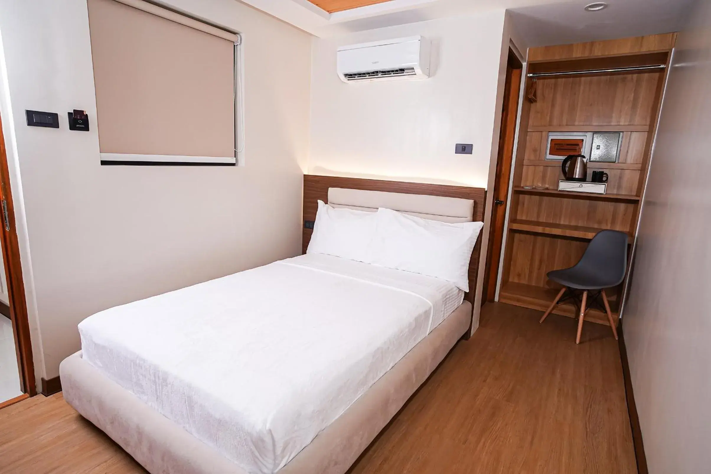 Bed in Gonzales Hotel Bed in Gonzales Hotel