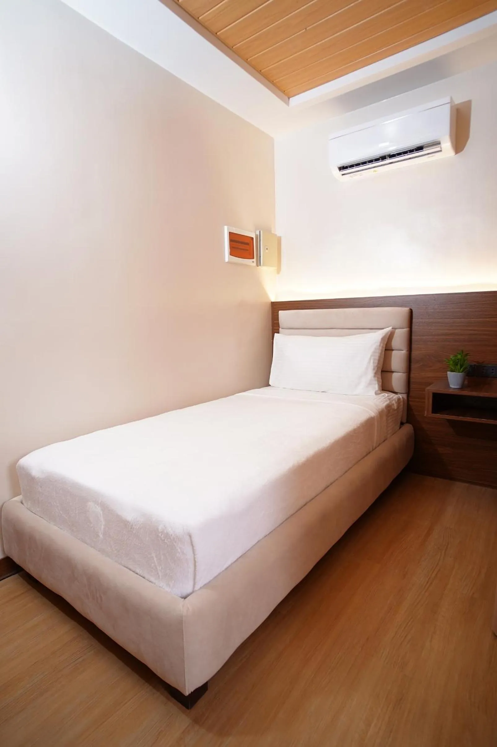 Bed in Gonzales Hotel