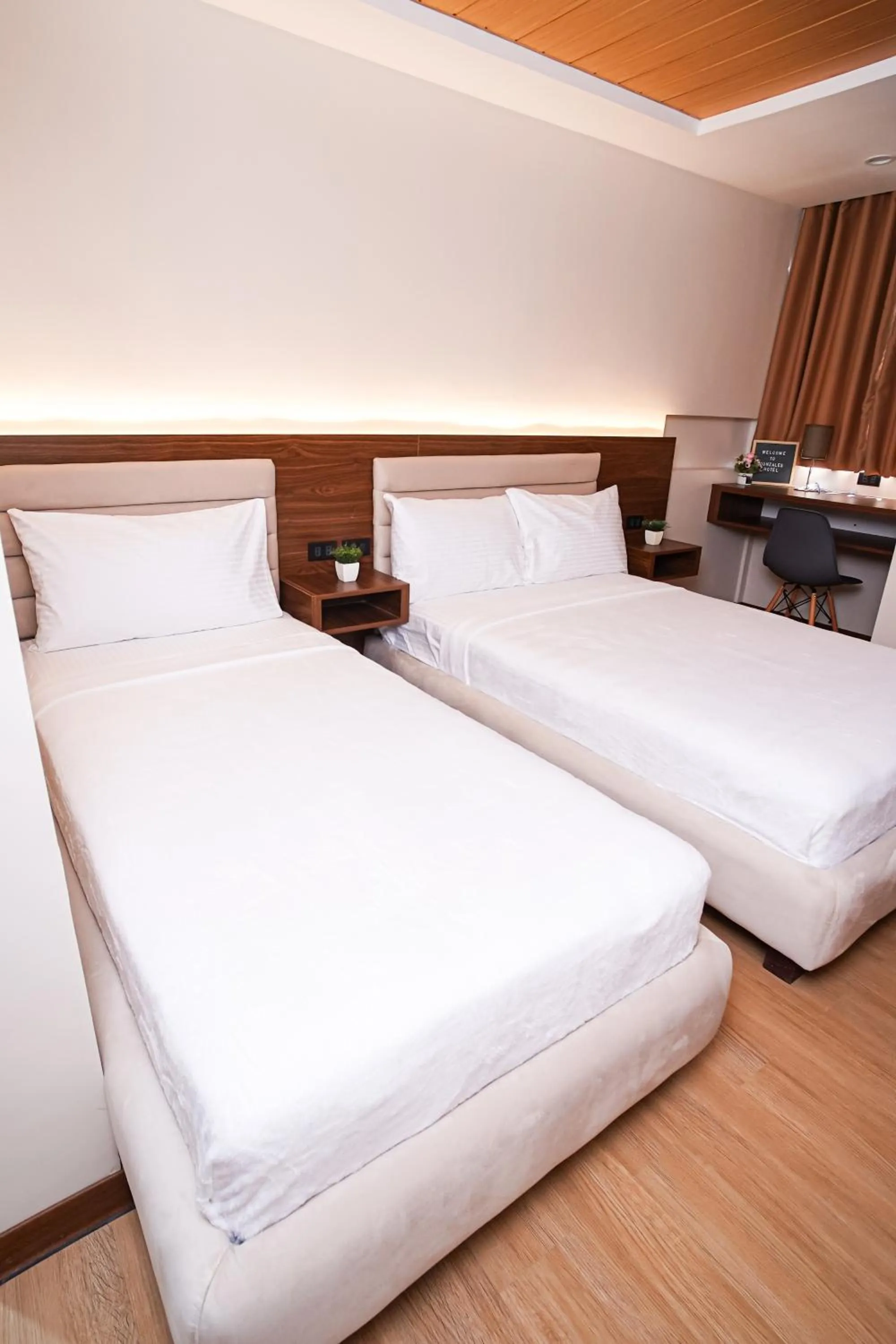 Bed in Gonzales Hotel