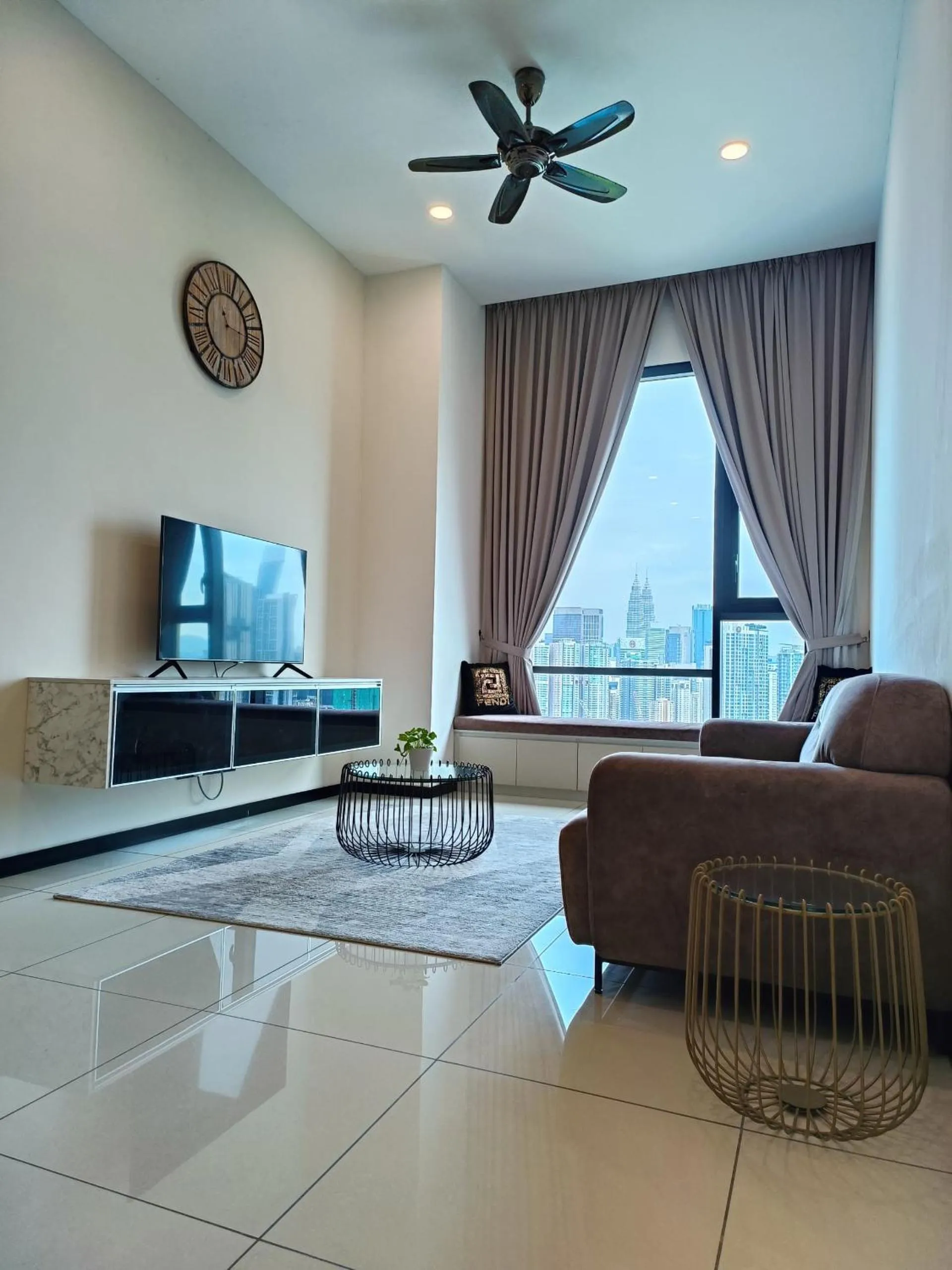 Living room in Opus Residences by Centurypro