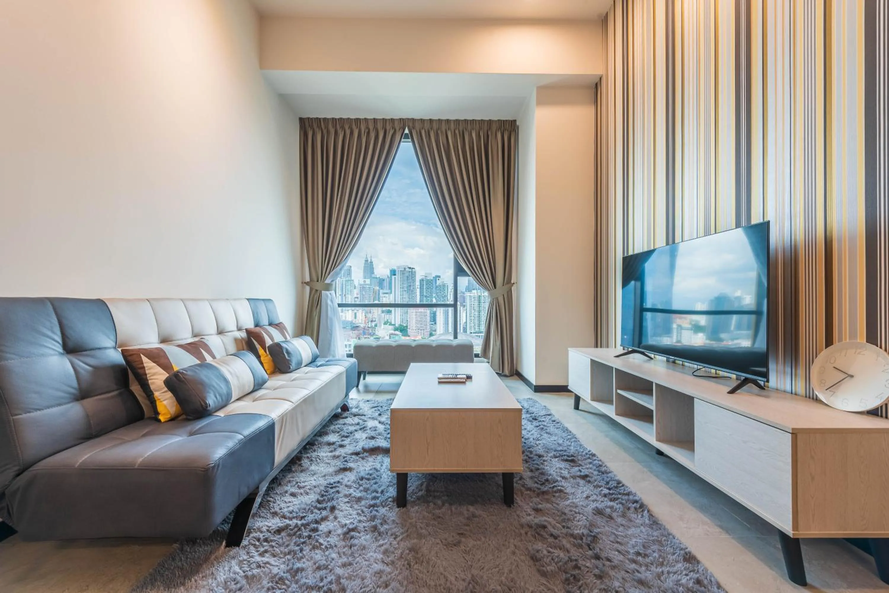 Living room in Opus Residences by Centurypro