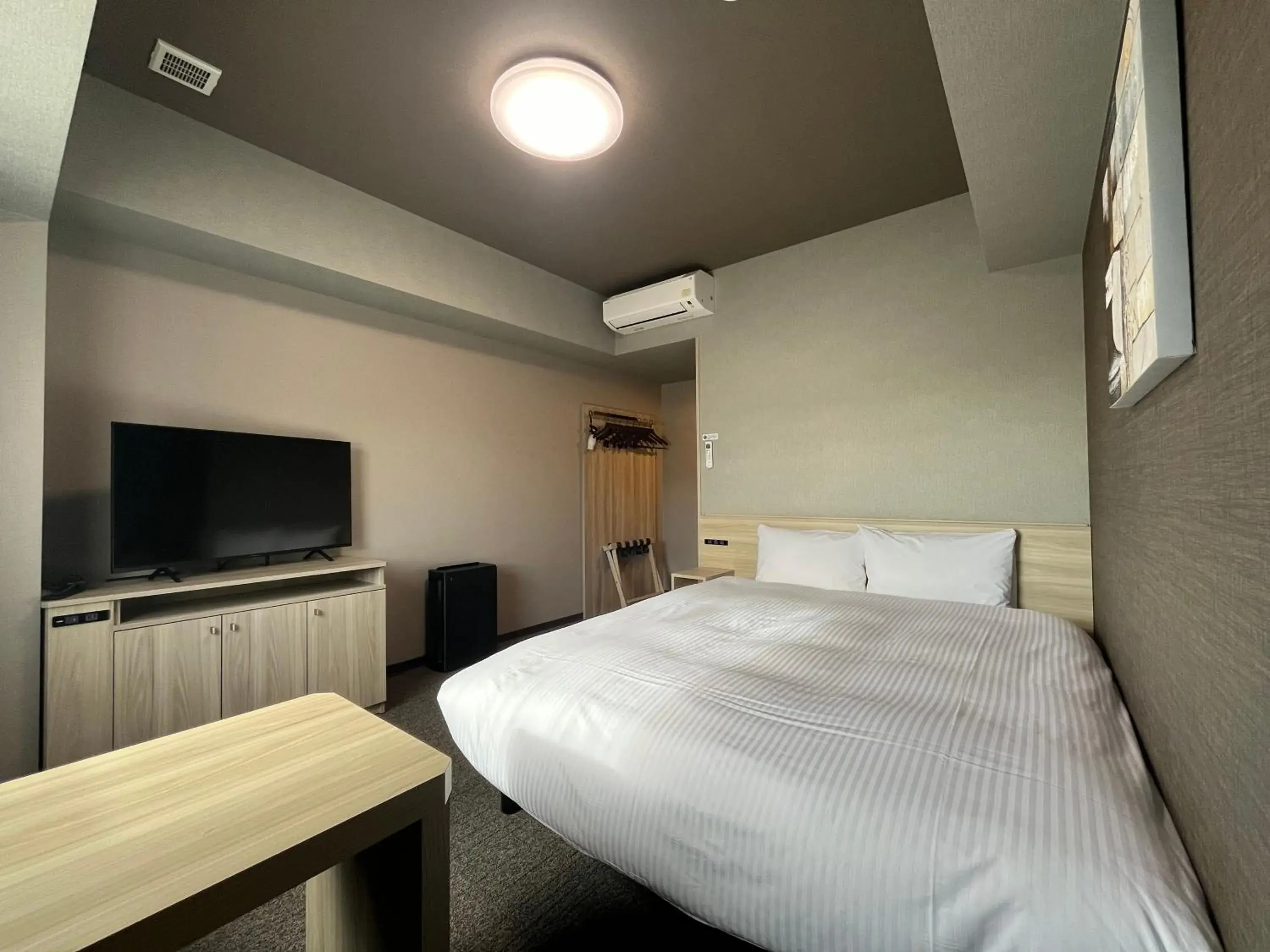 Photo of the whole room, Bed in Hotel Route Inn Suzaka Photo of the whole room, Bed in Hotel Route Inn Suzaka