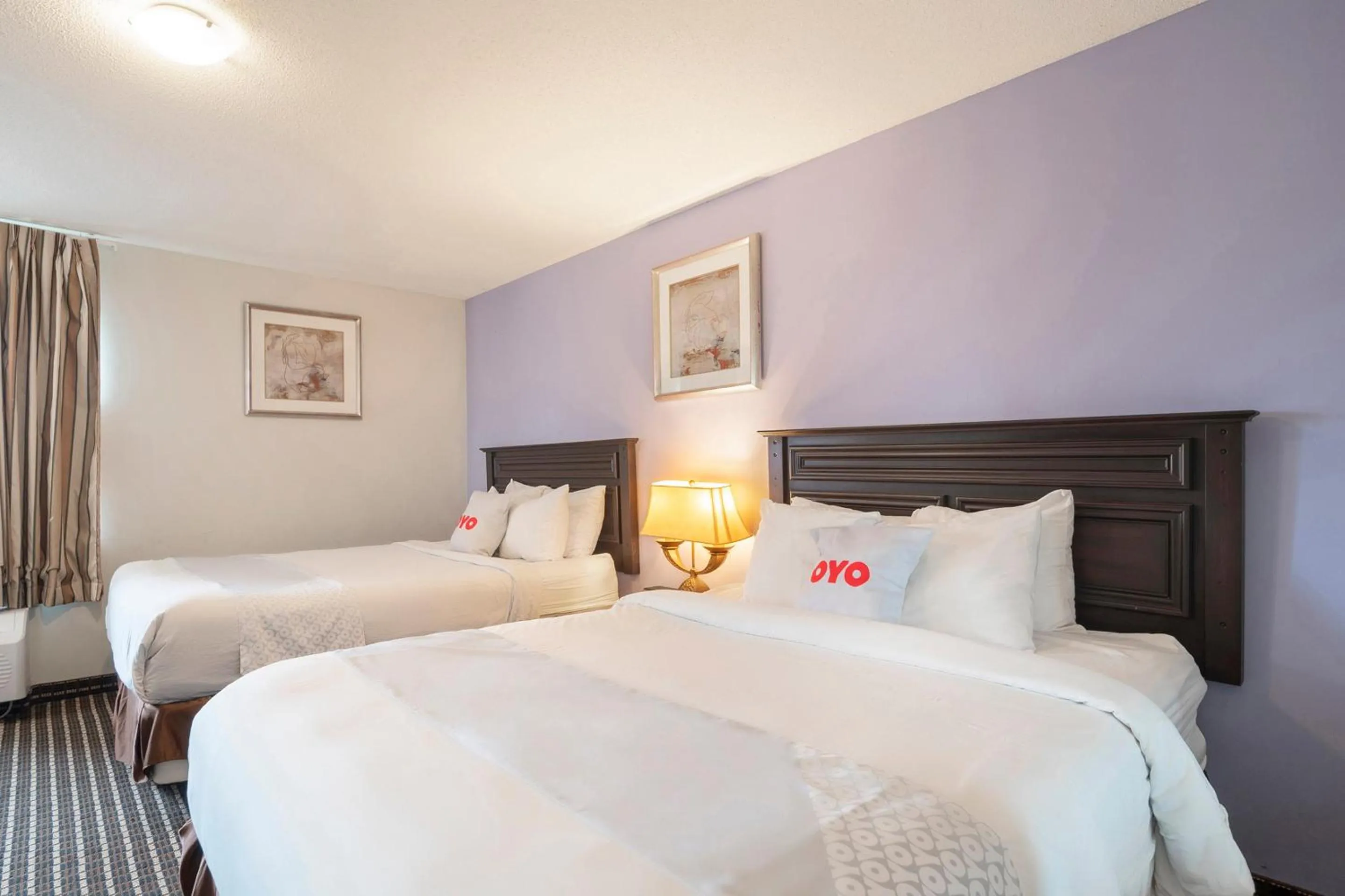 Bedroom, Bed in OYO Townhouse Houston Airport North