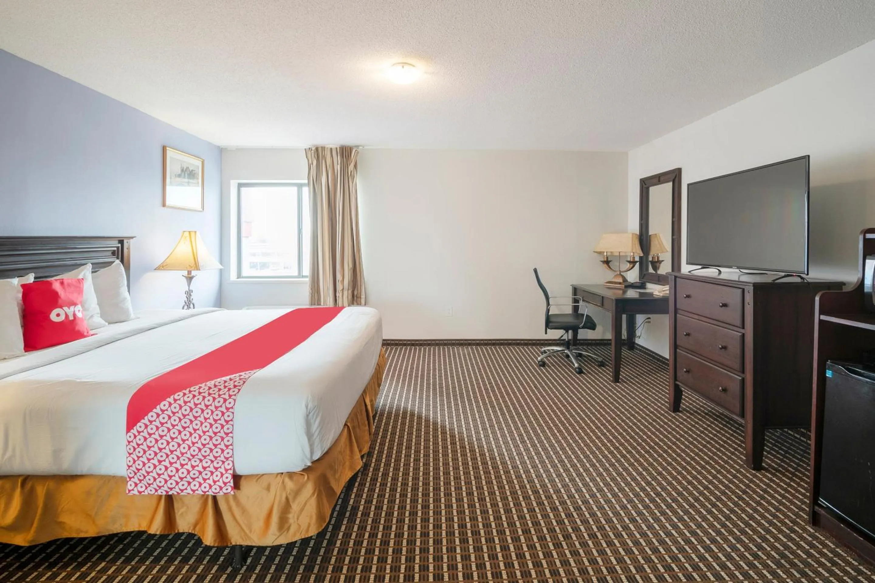 Bedroom, Bed in OYO Townhouse Houston Airport North