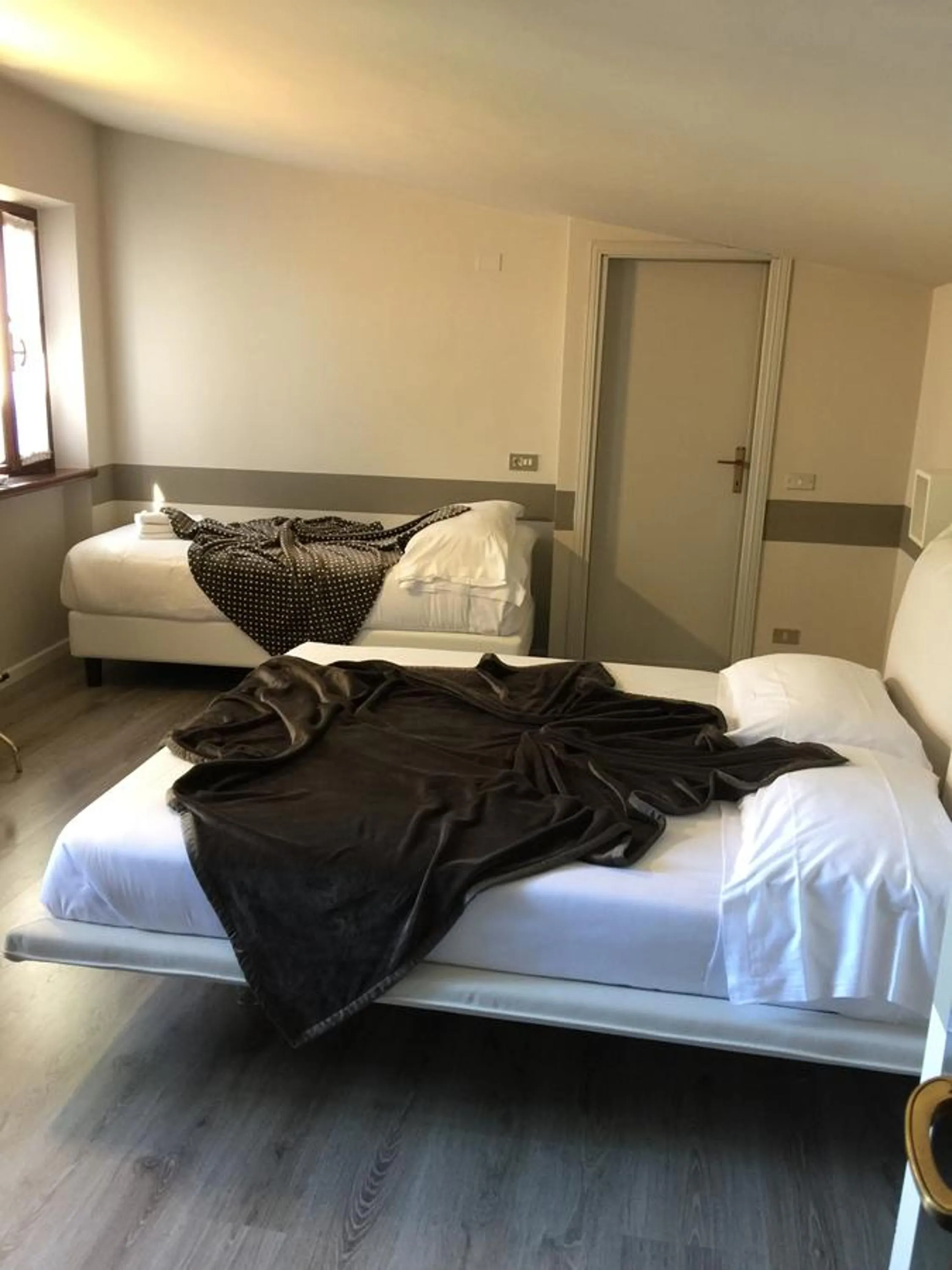 Bed in Albergo Al Cacciatore Tortellinando