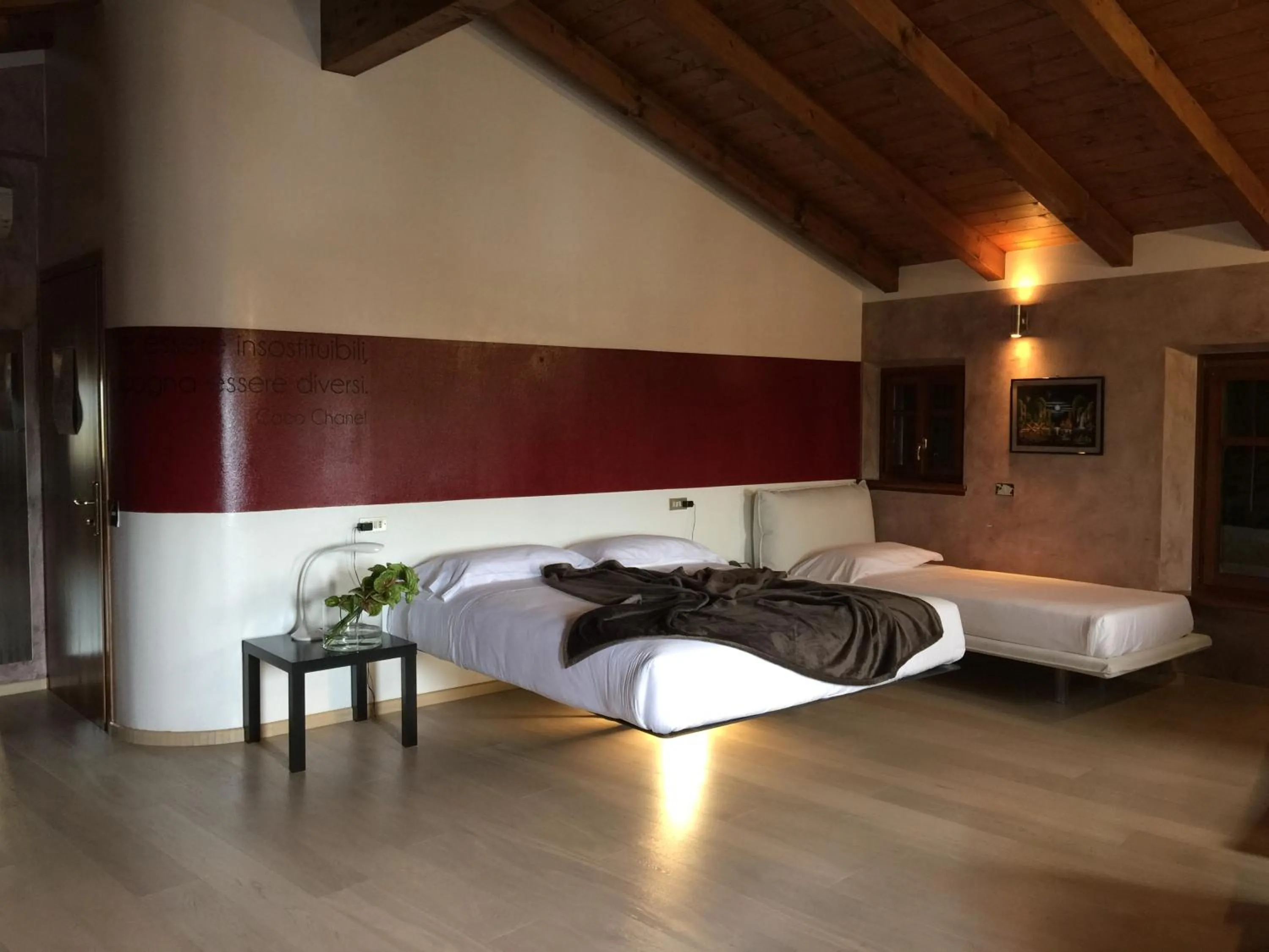 Bed in Albergo Al Cacciatore Tortellinando