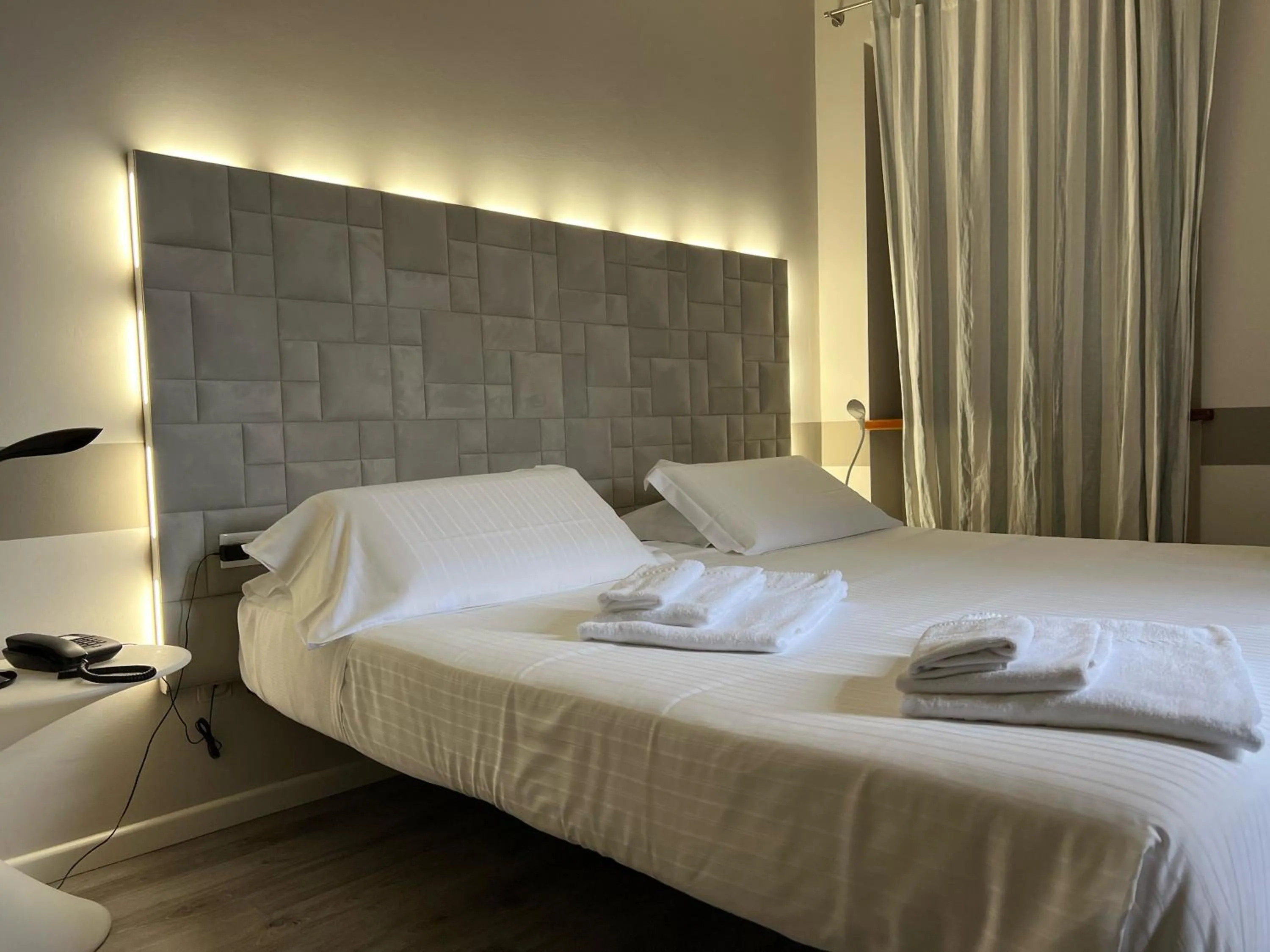 Bed in Albergo Al Cacciatore Tortellinando