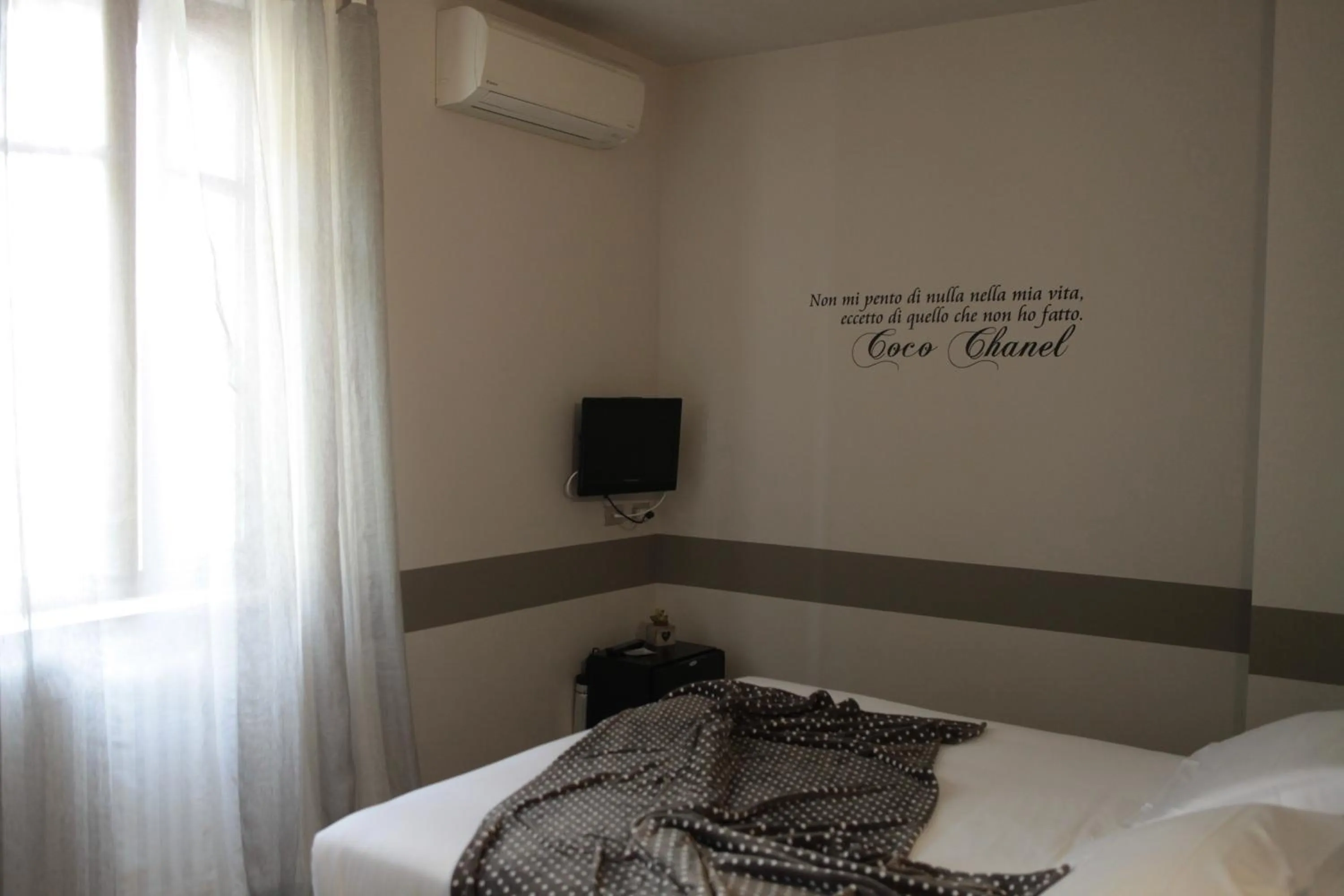 Bed in Albergo Al Cacciatore Tortellinando