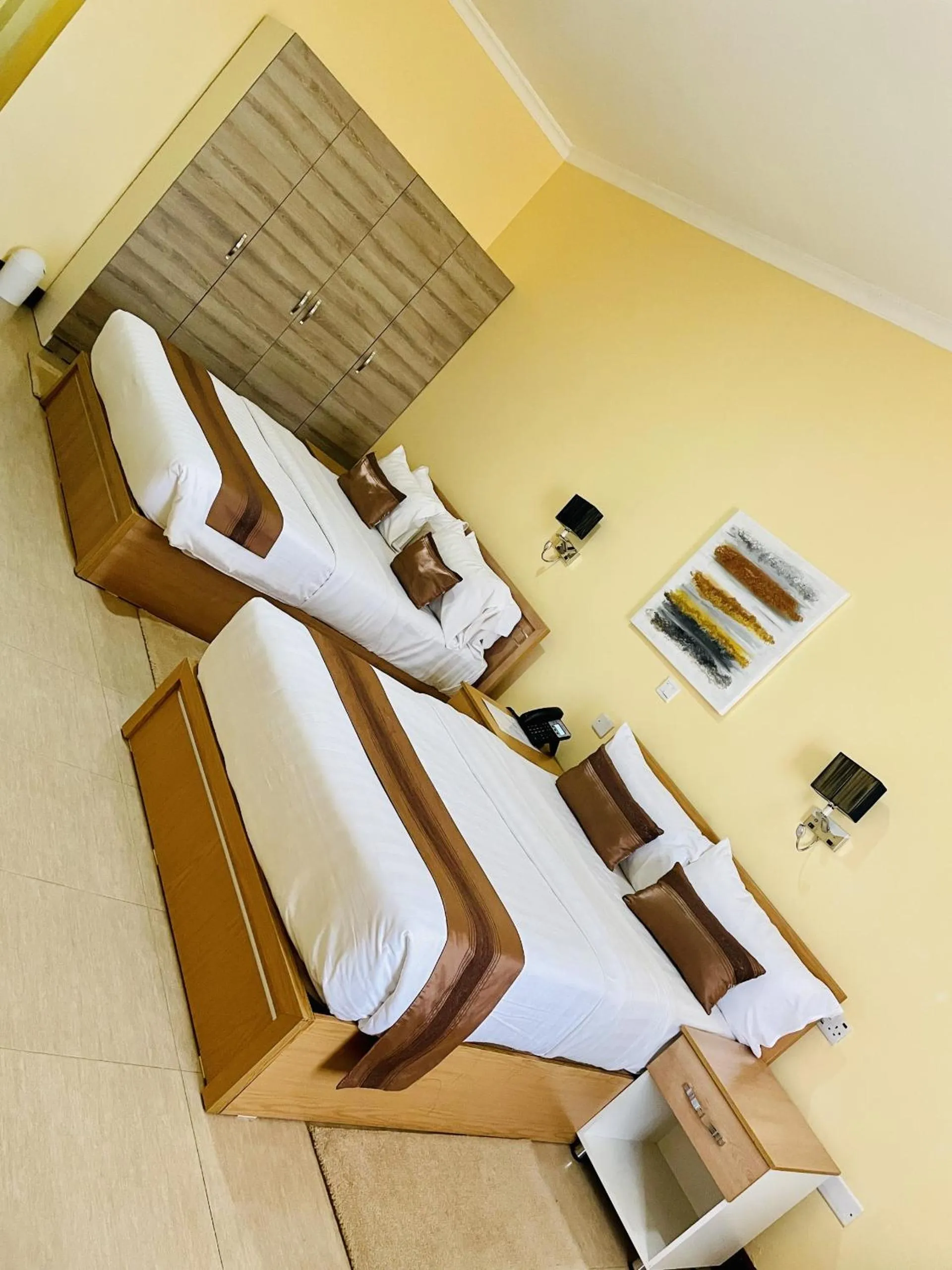 Bed in Nashera Hotels Dodoma