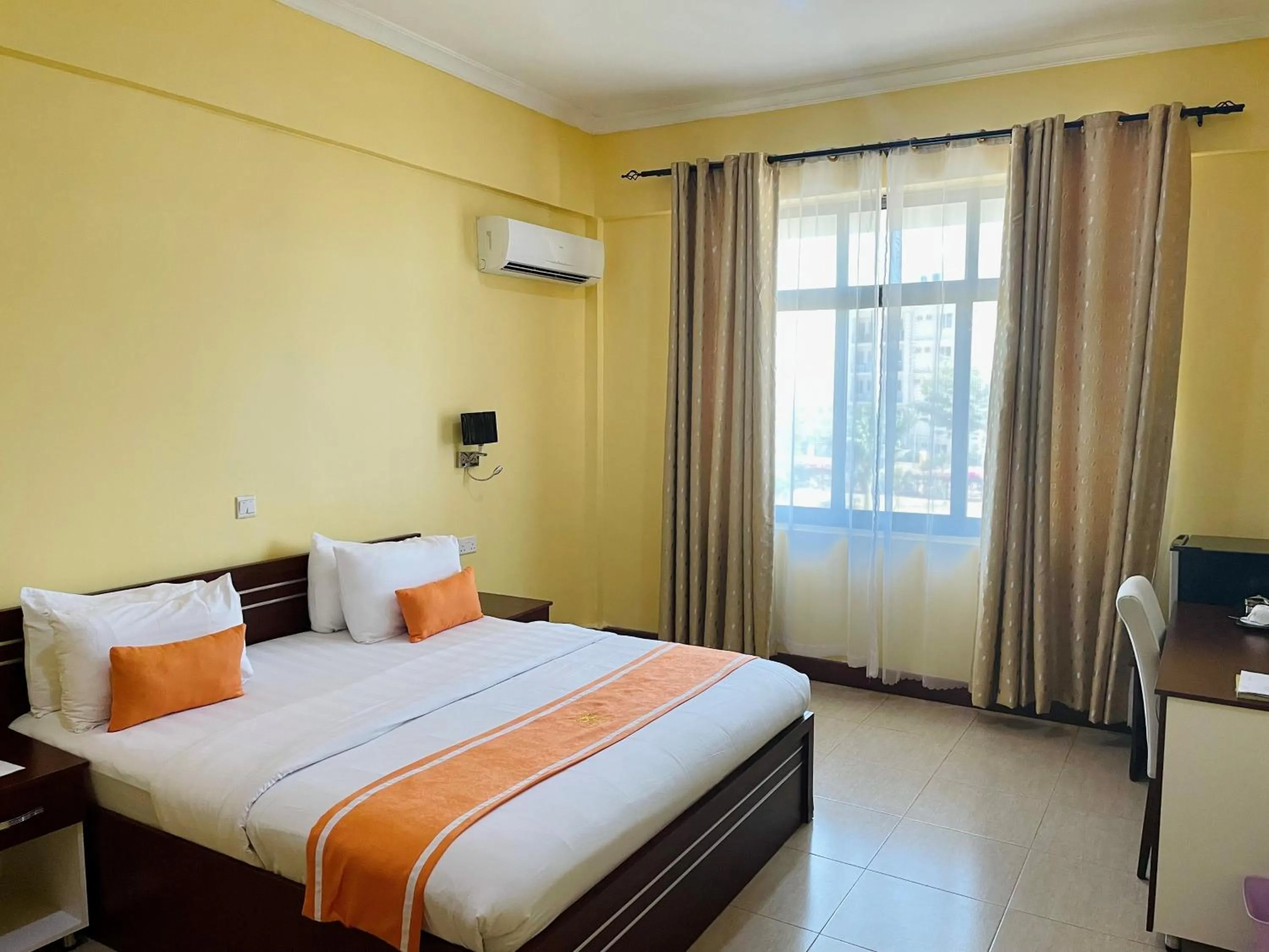 Bed in Nashera Hotels Dodoma