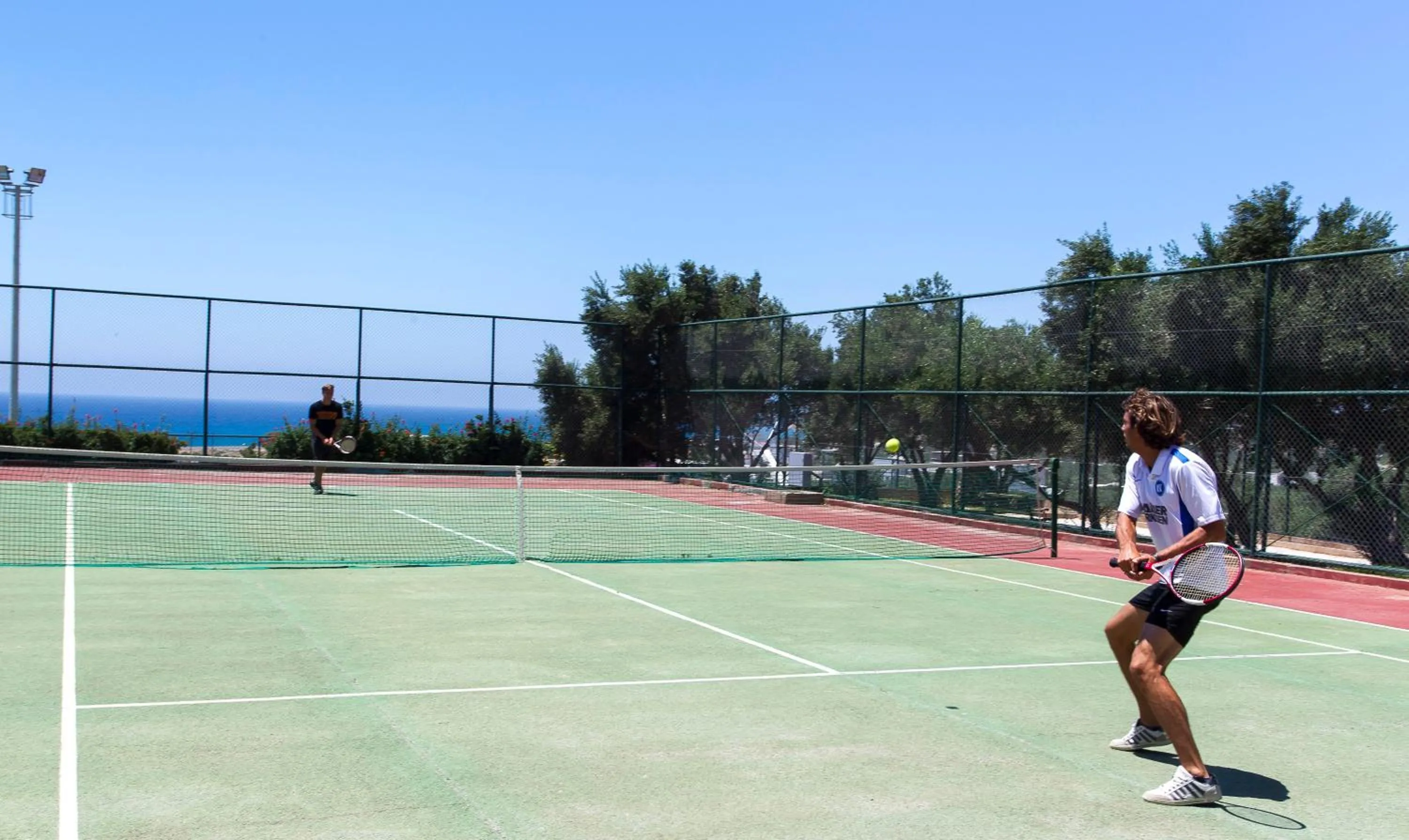 Tennis court in Mare Blue Hotel