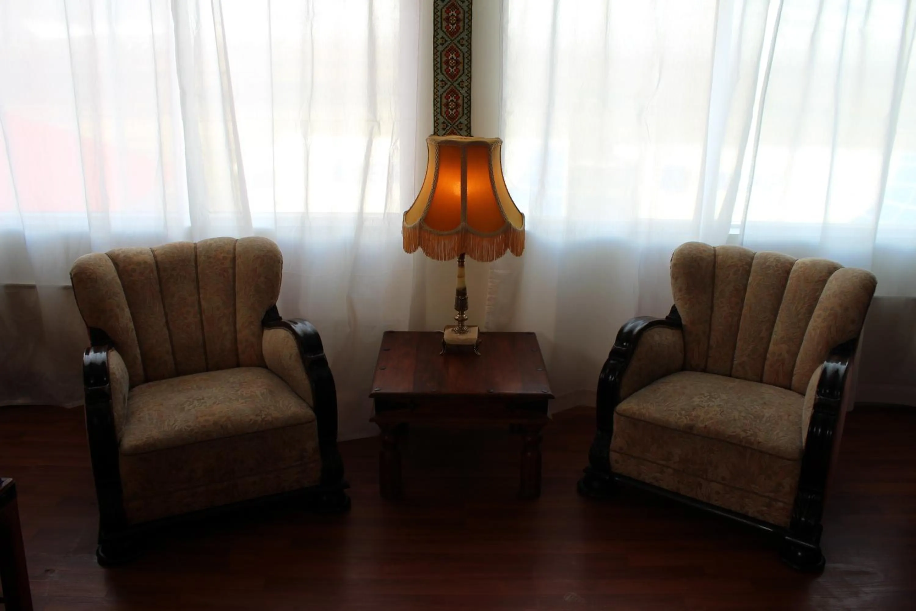 Communal lounge/ TV room in North West Restaurant & Guesthouse