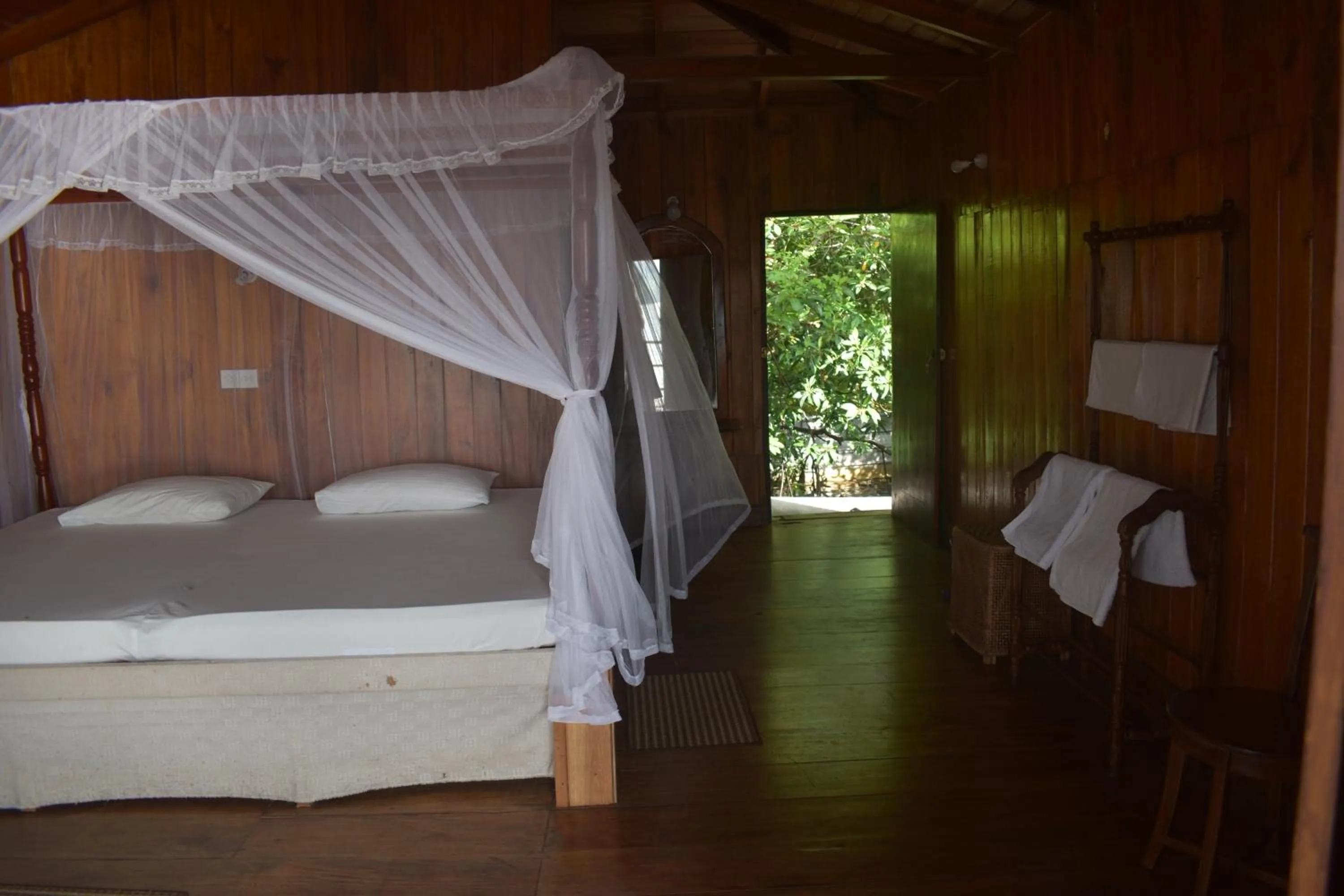 Bed in Shiny Lakeside Resort