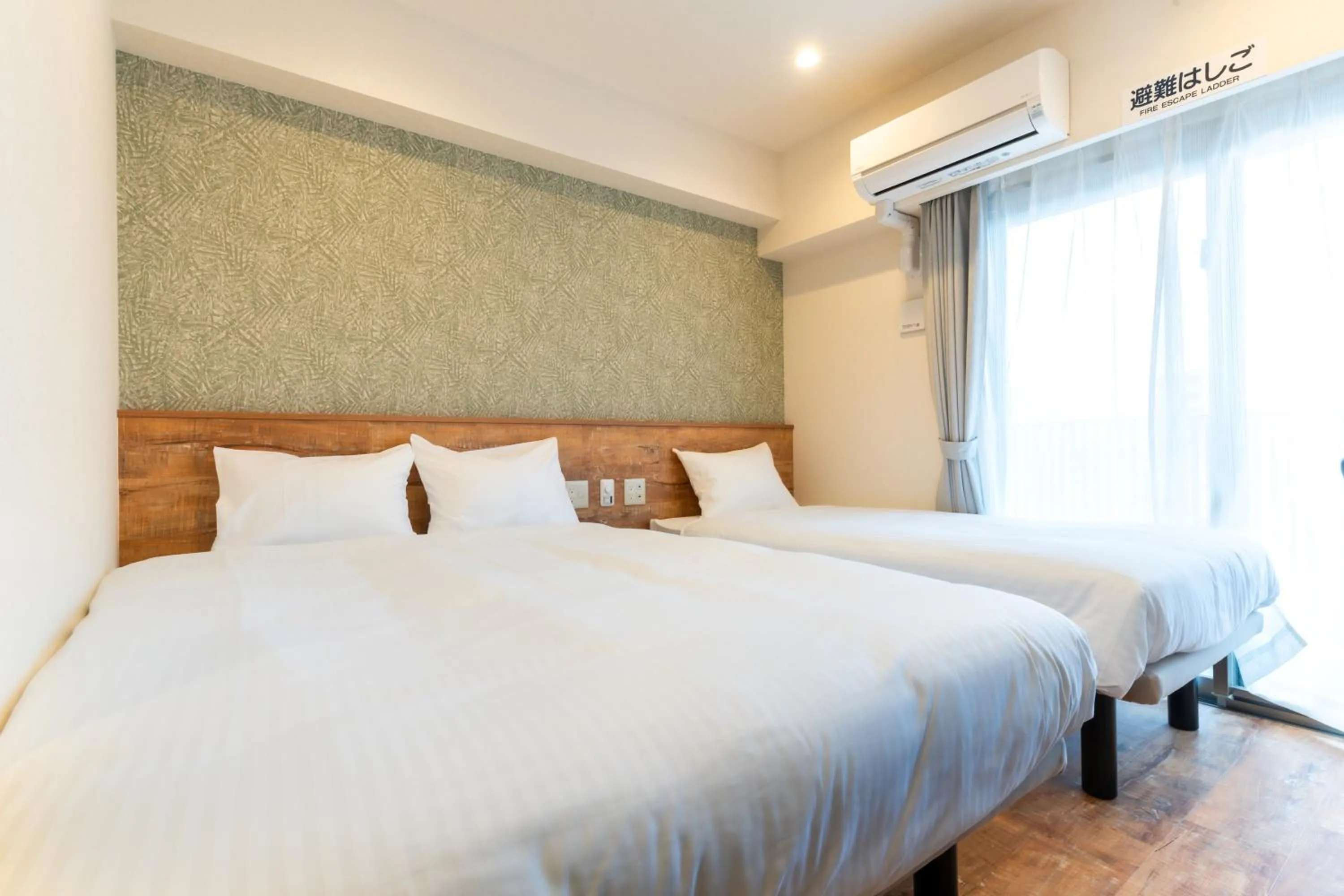 Bed in Hotel Living Inn Kenchoumaeeki