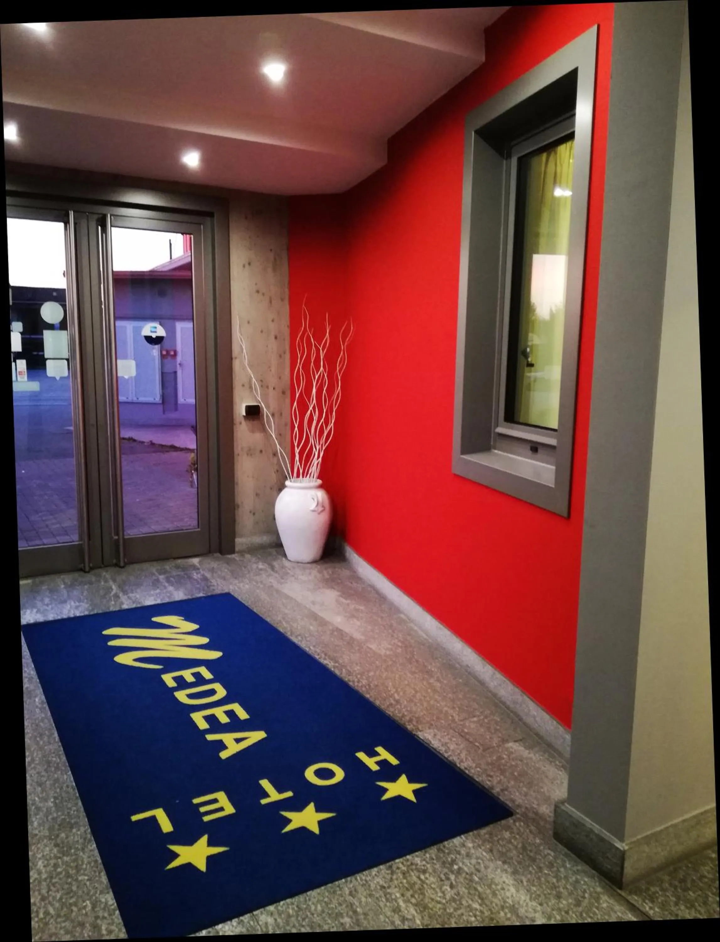 Property logo or sign in Hotel Medea