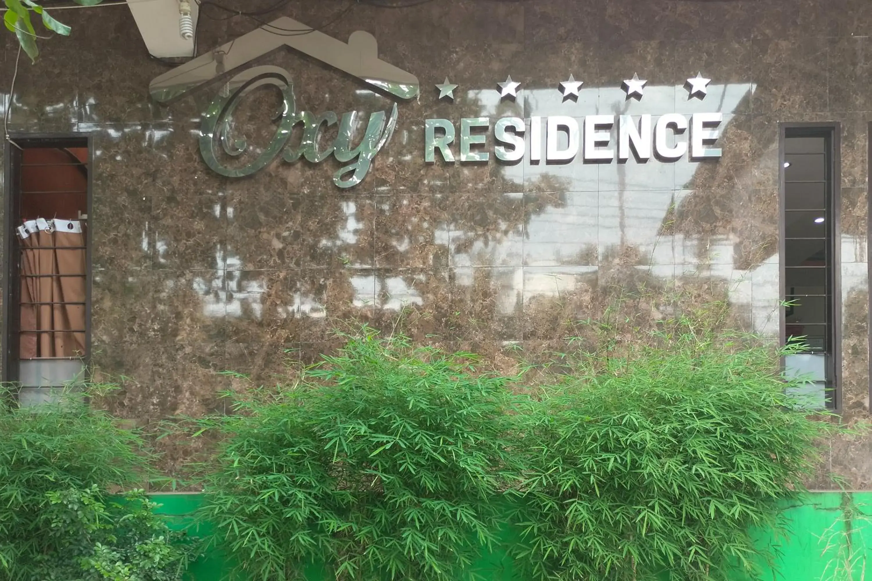 Property building in RedDoorz at Oxy Residence Manado Property building in RedDoorz at Oxy Residence Manado