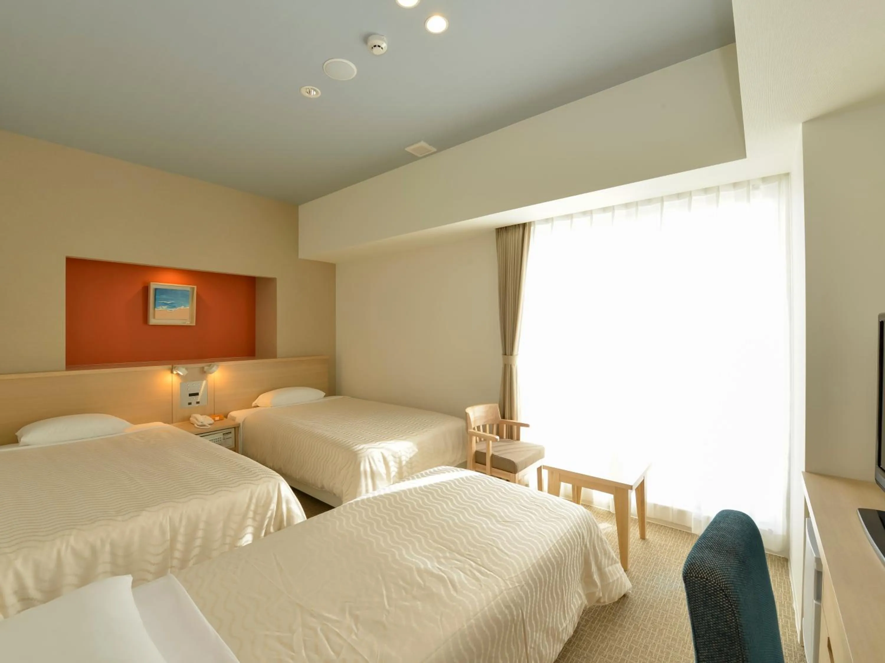 Bed in Hotel Risingsun Miyakojima