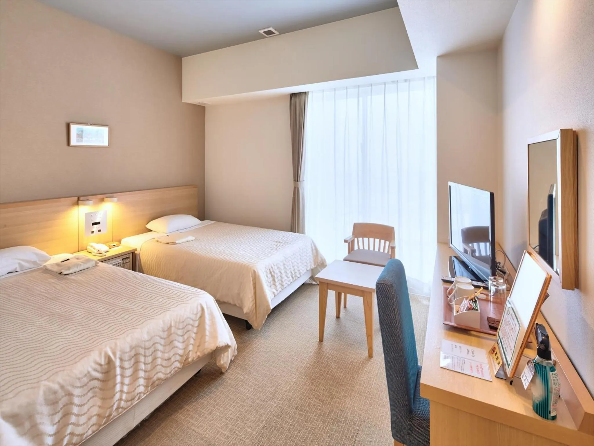 Photo of the whole room, Bed in Hotel Risingsun Miyakojima