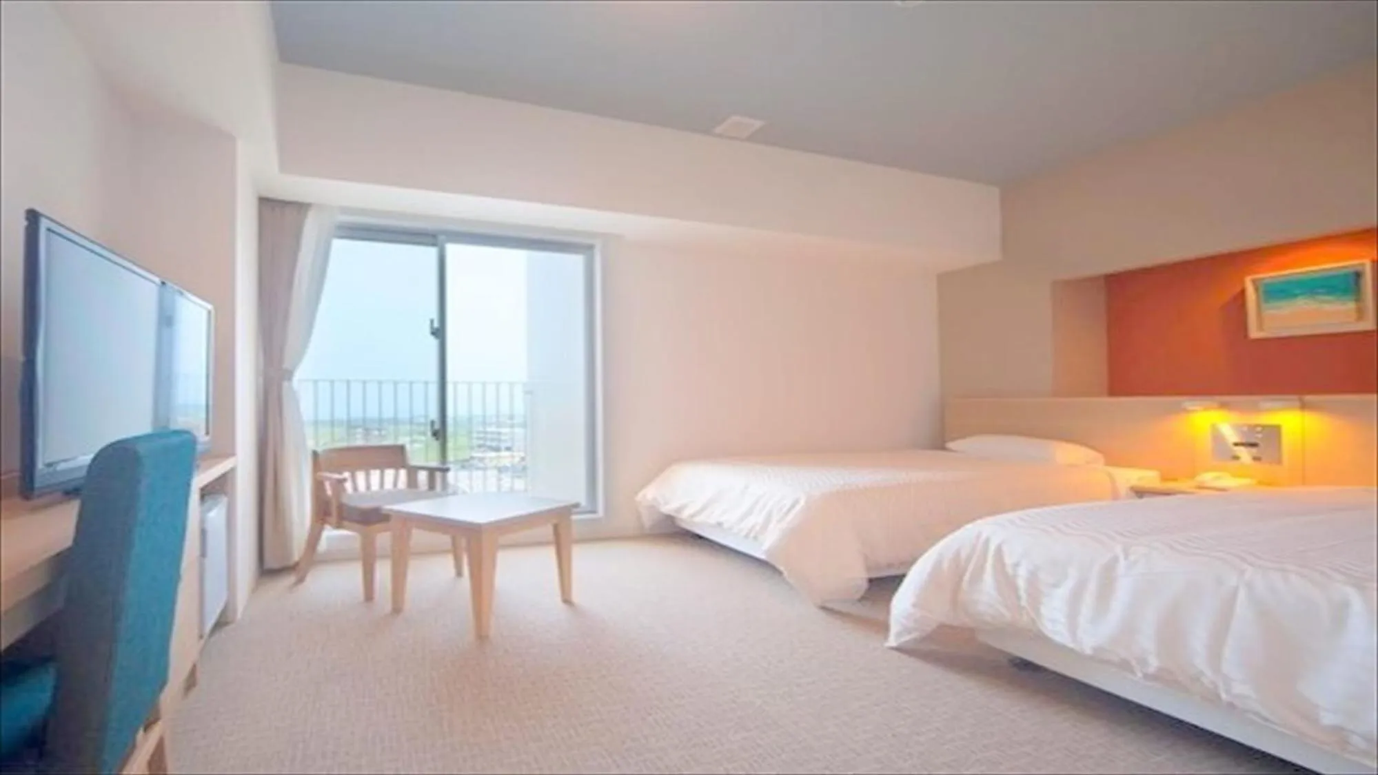Photo of the whole room, Bed in Hotel Risingsun Miyakojima
