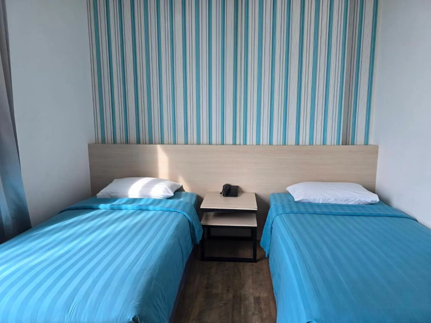 Photo of the whole room, Bed in D@Sea Hotel