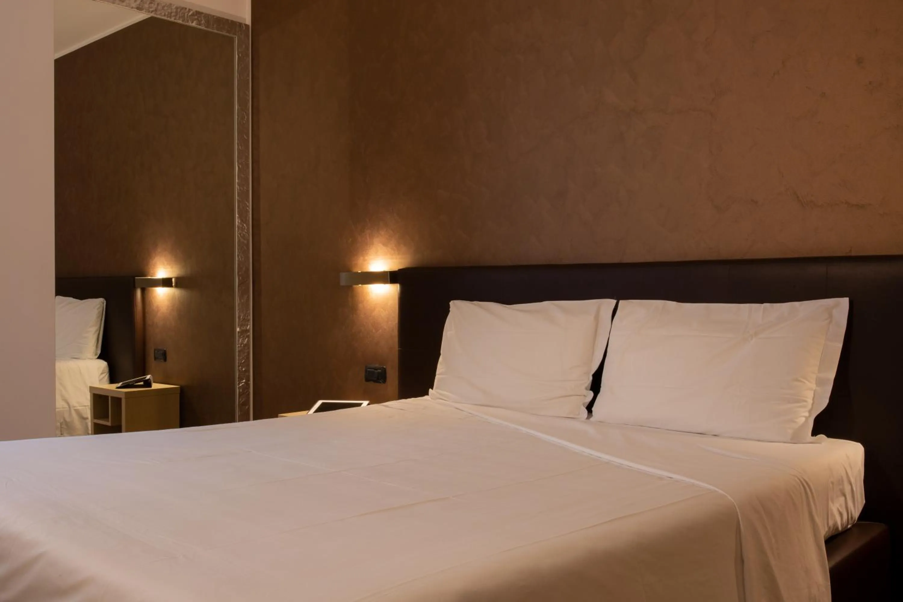 Bed in Euro Hotel Residence