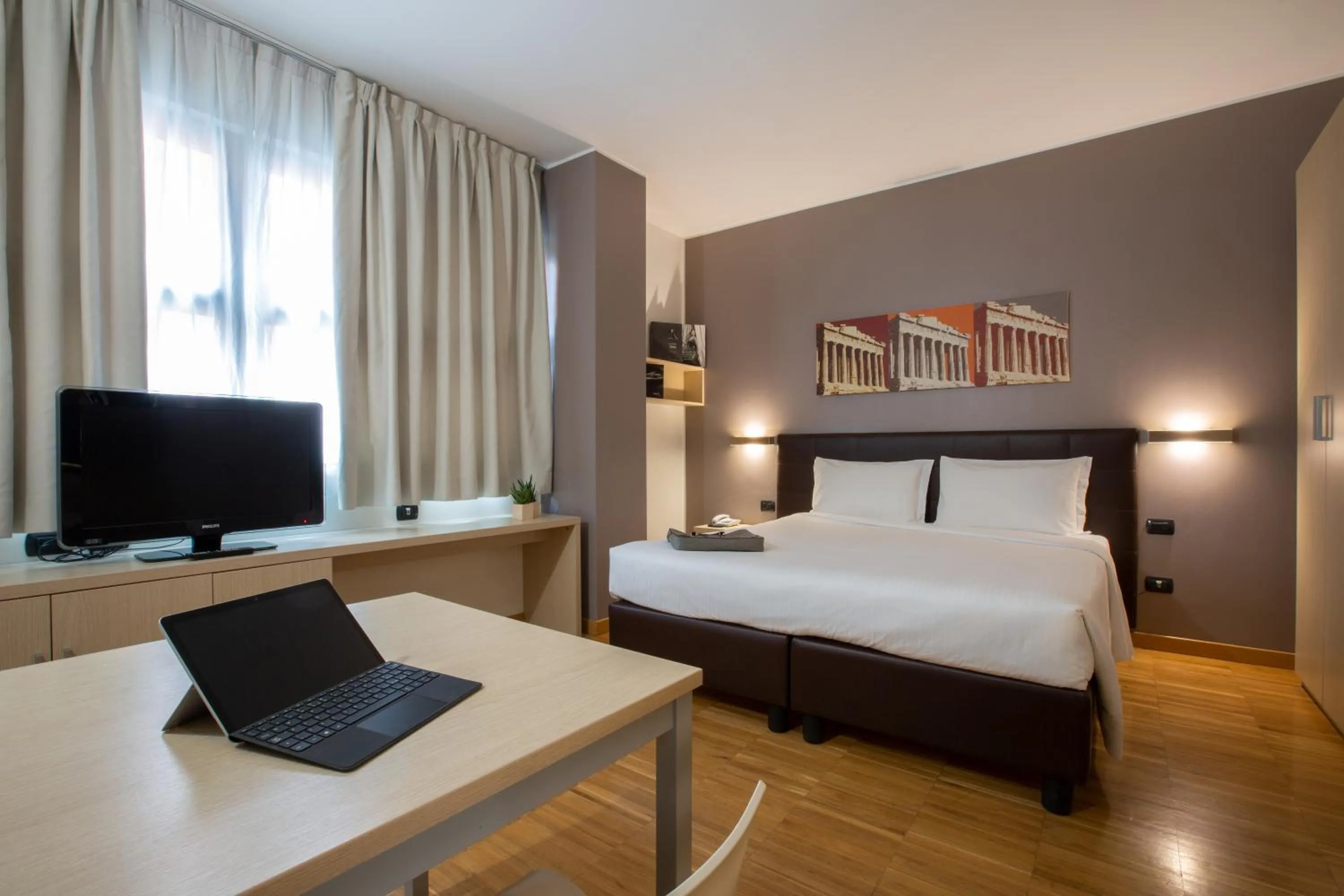 Bed in Euro Hotel Residence